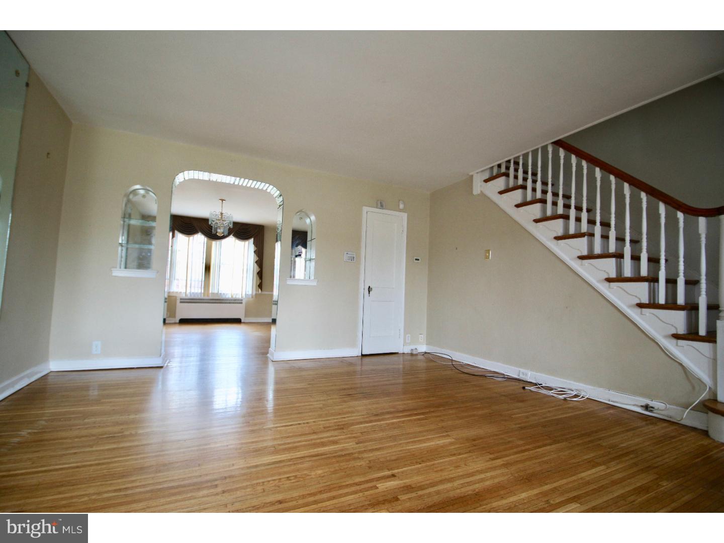 Available for an immediate move in: Three bedroom home located in the Oxford circle section of NE. Close to shopping public transportation and Roosevelt Blvd. This home has Hardwoods throughout, nice functional layout, and is great for a family or someone looking for a quiet single home. Can enter through the front or park in the dedicated space in back and enter the home through the basement level. Basement is finished and good for extra recreational space or storage. Tenants pay water, electric, and heat