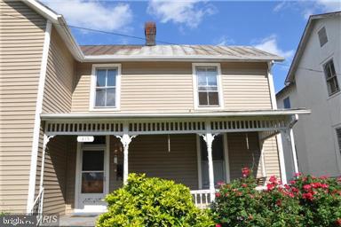 Beautiful home with hardwood floors throughout the rooms except the bathroom and kitchen.  The main level has very large sized  family room, formal room, separate dining room, bathroom, kitchen and laundry room.  The upper level has 3 large sized bedrooms.  There is parking space for 2 cars at the back of the home. nice sized front and rear yard.  Dogs are on a case by case basis and NO cats.