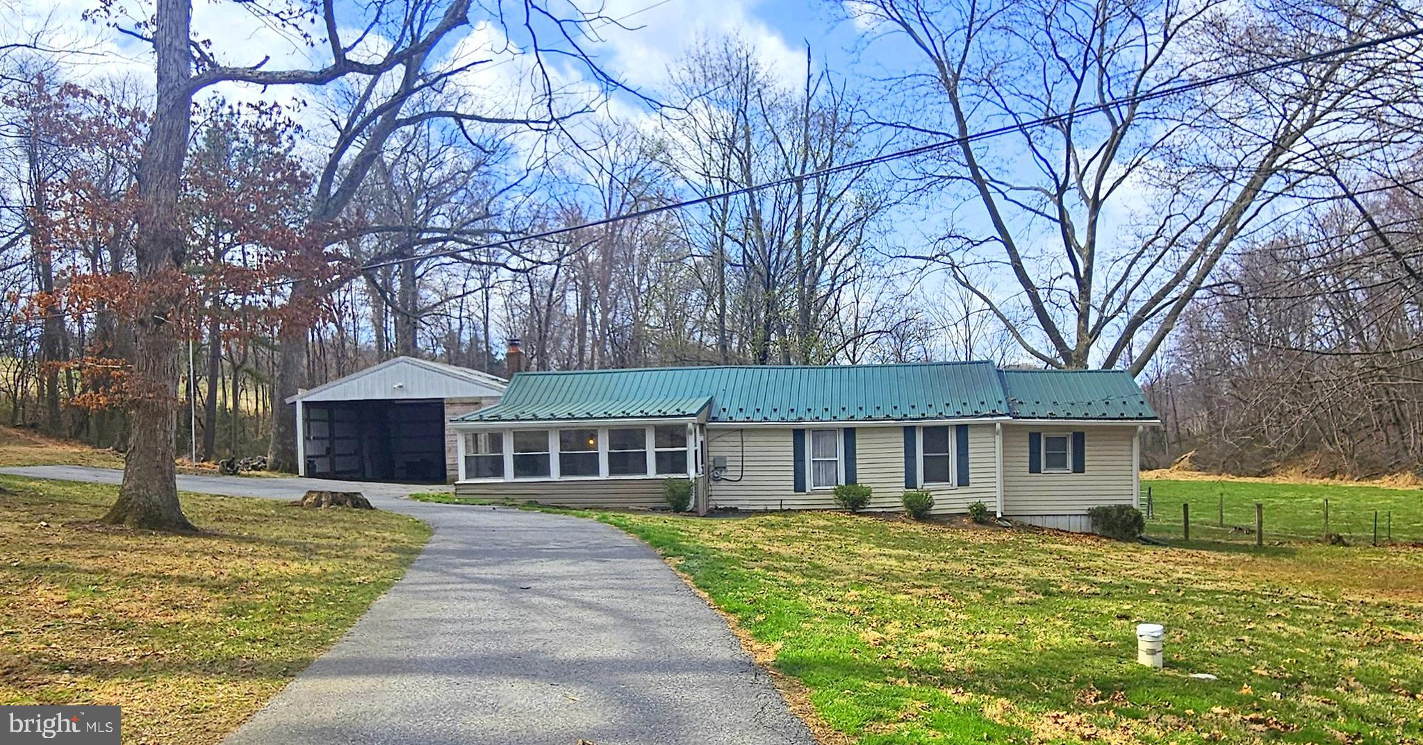 Value maybe  in the land.  HANDYMAN SPECIAL!  2-3 Bedroom Rancher Sold As-Is.  One bedroom is a pass through.  Private Pond.  New Steel Roof and Downspouts Well 2018.  Bring your tool box and make this your quiet retreat!

Past deadline for new perc test.  Inspection was done for informational purposes.