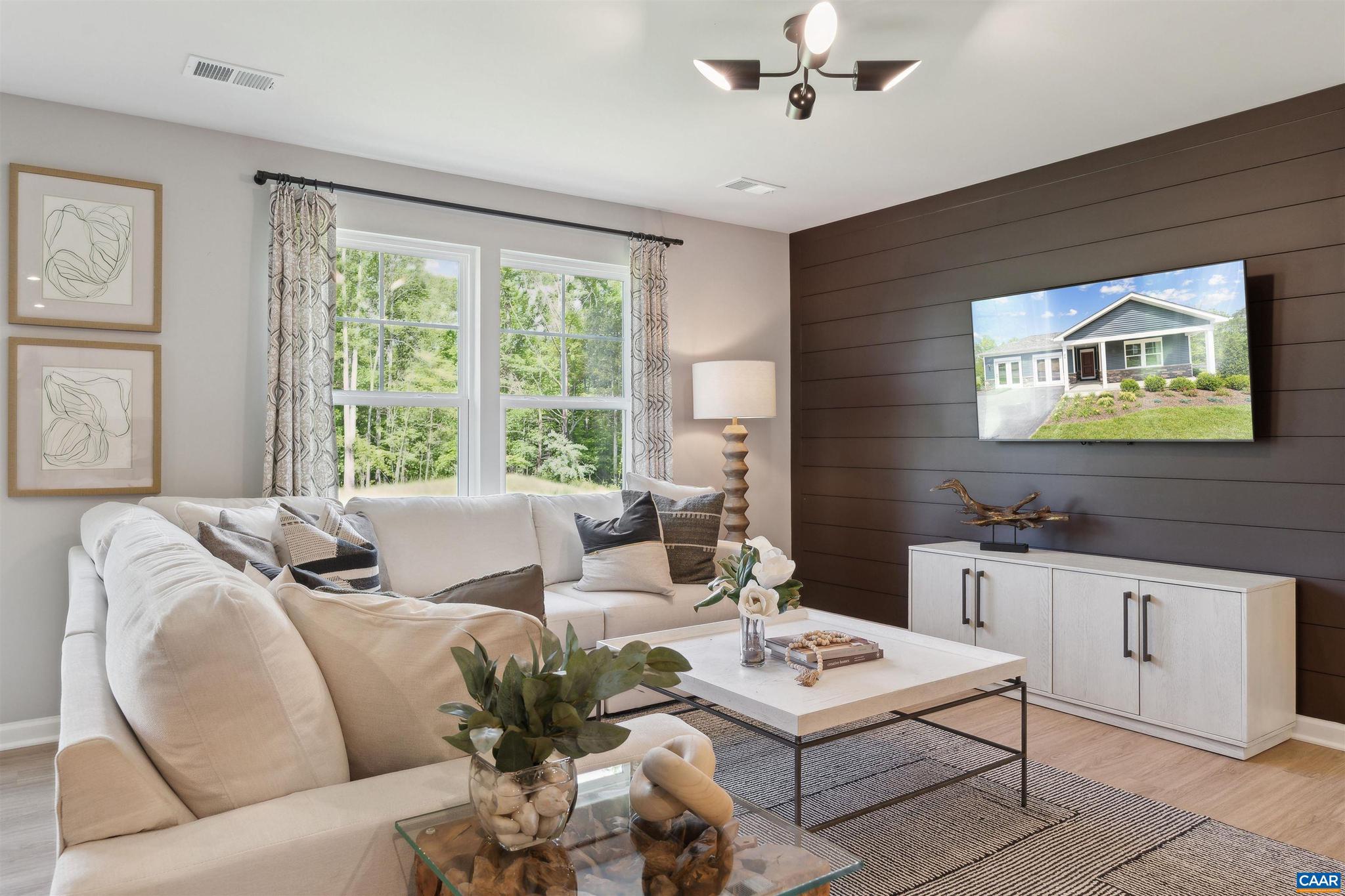 Welcome to The Irving at Essence at Creekside! Estimated for completion September 2026, this brand-new home offers low-maintenance main-level living with 3 bedrooms, 2 full baths, and a bright, open-concept design. This homesite boasts an expansive covered front porch to perfect for enjoying your morning coffee. The modern kitchen features quartz countertops, stainless steel appliances, a large center island, and a breakfast nook that flows seamlessly into the dining and family areas. A pocket office makes working from home simple, while a 2-car front-load garage provides convenience and storage. Step outside to your private rear patio, perfect for morning coffee or evening relaxation. | At Creekside, enjoy on-site walking trails, a children?s playground, and outdoor firepits, plus access to resort style amenities such as two pools, a clubhouse with fitness center, and pickleball courts. Surrounded by scenic mountain views, this vibrant community is just minutes from Route 29, Target, Hollymead Town Center, Charlottesville-Albemarle Airport, and UVA. | The price of this home includes all options and finishes. Schedule your private tour today and take advantage of $25,000 in savings before this opportunity is gone!,Painted Cabinets,Quartz Counter,Solid Surface Counter