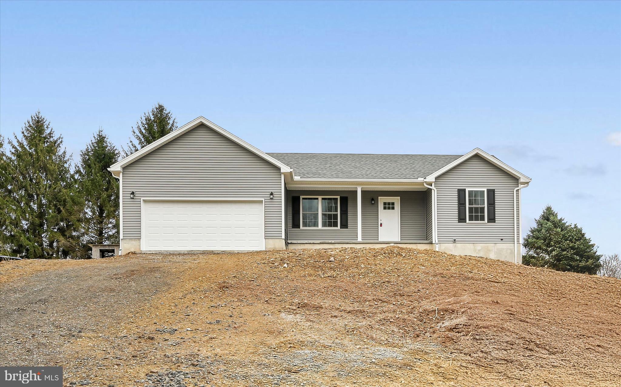 Be the first to call this brand-new ranch-style home your own! Completed new construction in the Lake Wynonah community, this property offers 3 bedrooms and 2 full bathrooms — perfect for comfortable single-floor living. Step inside to find a fresh, modern layout featuring a bright living area, a thoughtfully designed kitchen with granite countertops, island, all-new cabinetry, and stylish finishes. The paved driveway adds convenience and curb appeal, making parking easy and low-maintenance. Located within the highly rated Blue Mountain School District! Enjoy all the amenities Lake Wynonah has to offer — private lakes, recreation, and a welcoming neighborhood. Plus, you’re just minutes from Route 183 and Route 61 for an easy commute. Don’t miss this opportunity to own a newly built home with upscale finishes in one of the area’s most desirable communities — schedule your private showing today!  ** Yard and Paved Driveway have been completed **
