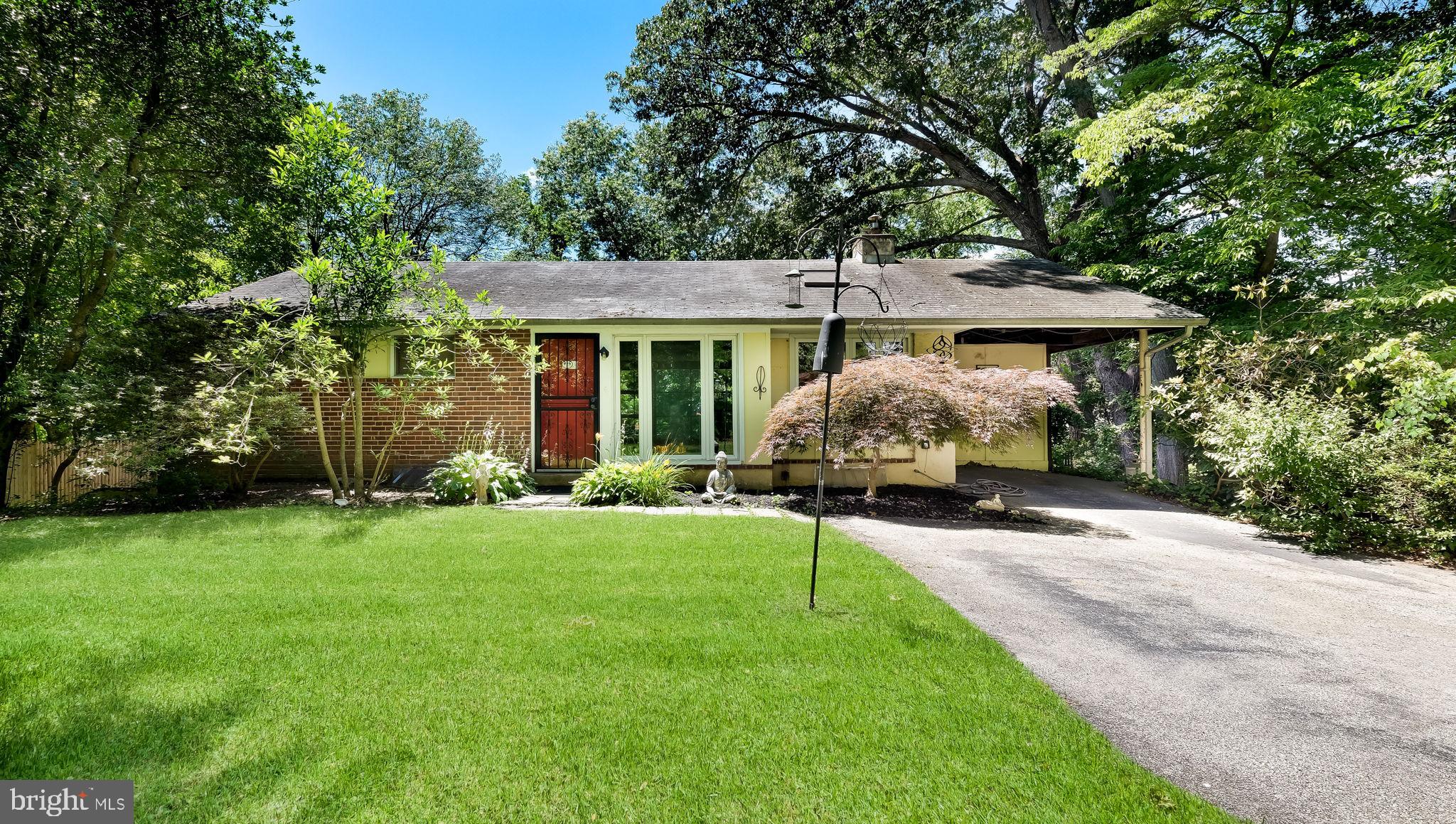 Don't miss this opportunity to own a 4 bedroom, 2-full bathroom home in Media, with Rose Tree-Media schools and a convenient access to the borough of Media for it's shops, restaurants, parades and special events like Dining Under the Stars. Located on a shady street with little through-traffic, this home offers a peaceful setting without sacrificing any of the conveniences of everybody's home town. Enter onto the main level with hardwood floors and custom natural wood built-ins. This level, like the one below, is flooded with natural light through a wall of windows. The convenient open galley kitchen includes a small  breakfast bar. The kitchen can also be accessed through a side door with covered entry. Beyond the kitchen is the open living-dining room with a cozy brick fireplace. From this room, you can access the shady screened in porch.  Two bedrooms and a full hall bathroom complete the main level. Downstairs, a carpeted family room has access to the backyard, which adjoins community open space and a babbling stream. The lower level also has two bedrooms, another full hall bathroom, and a laundry/utility room with additional storage space. A full attic with pull-down stairs in the main level hallway offers even more storage, and there is a shed area under the screened in porch. This home is priced to sell and ready for new owners to breath new life into it and make it their own!