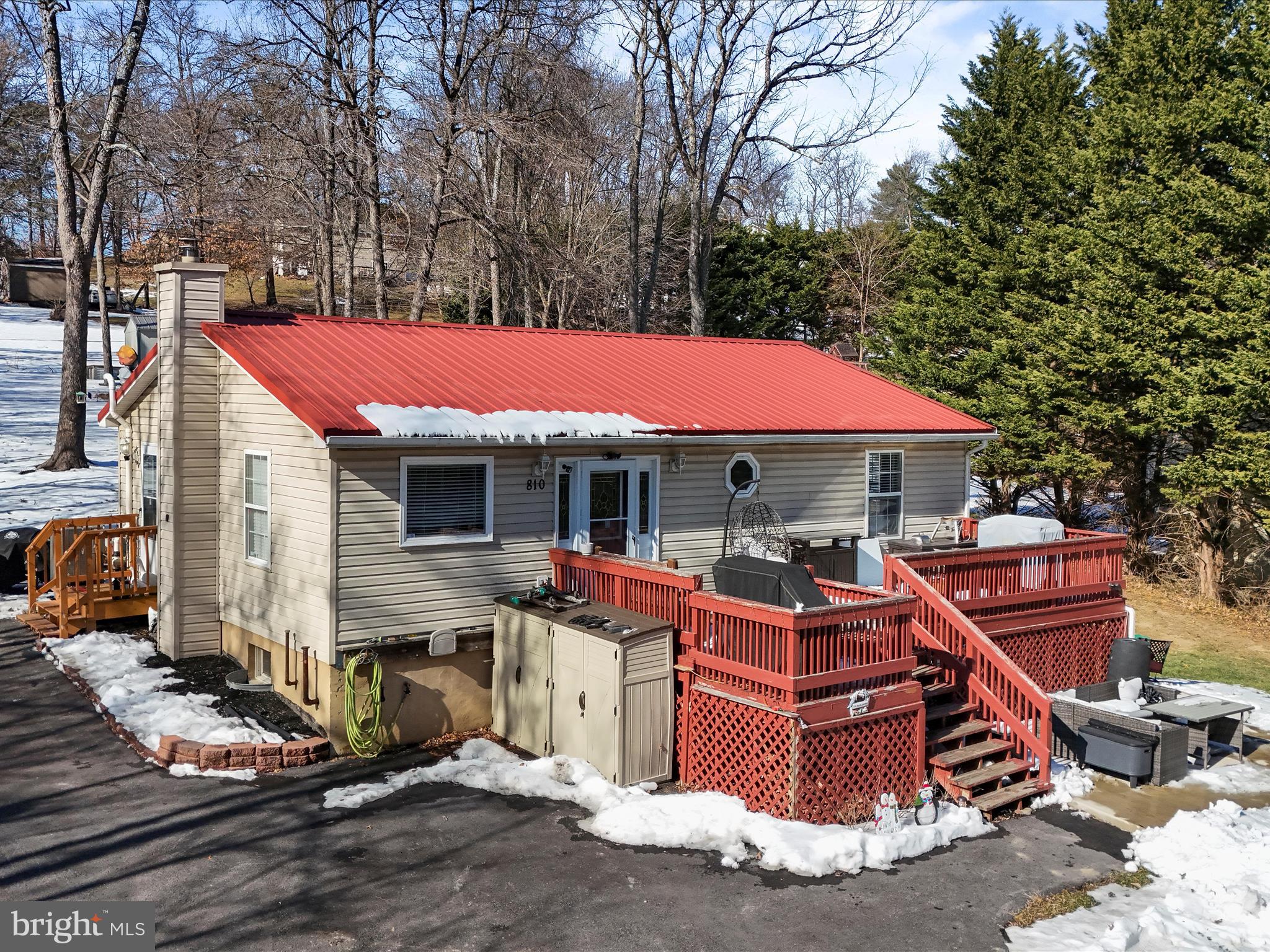 Welcome to 810 Mission Rd! This charming, move-in-ready ranch-style home, with no HOA, offers three bedrooms and two full bathrooms on a spacious 0.78-acre lot. Notable features include a large asphalt driveway that comfortably accommodates 7-8 vehicles, brand-new stainless steel appliances, a new Lennox heat pump, a 12x17 concrete patio, a Culligan water softener, and LVP flooring in the bedrooms. The backyard also boasts a 10x16 shed for additional storage, while the unfinished half of the basement provides ample storage space. Conveniently located near major commuter routes 7 and US-340, this home offers both comfort and accessibility. Don’t miss this incredible opportunity—schedule your private tour today!