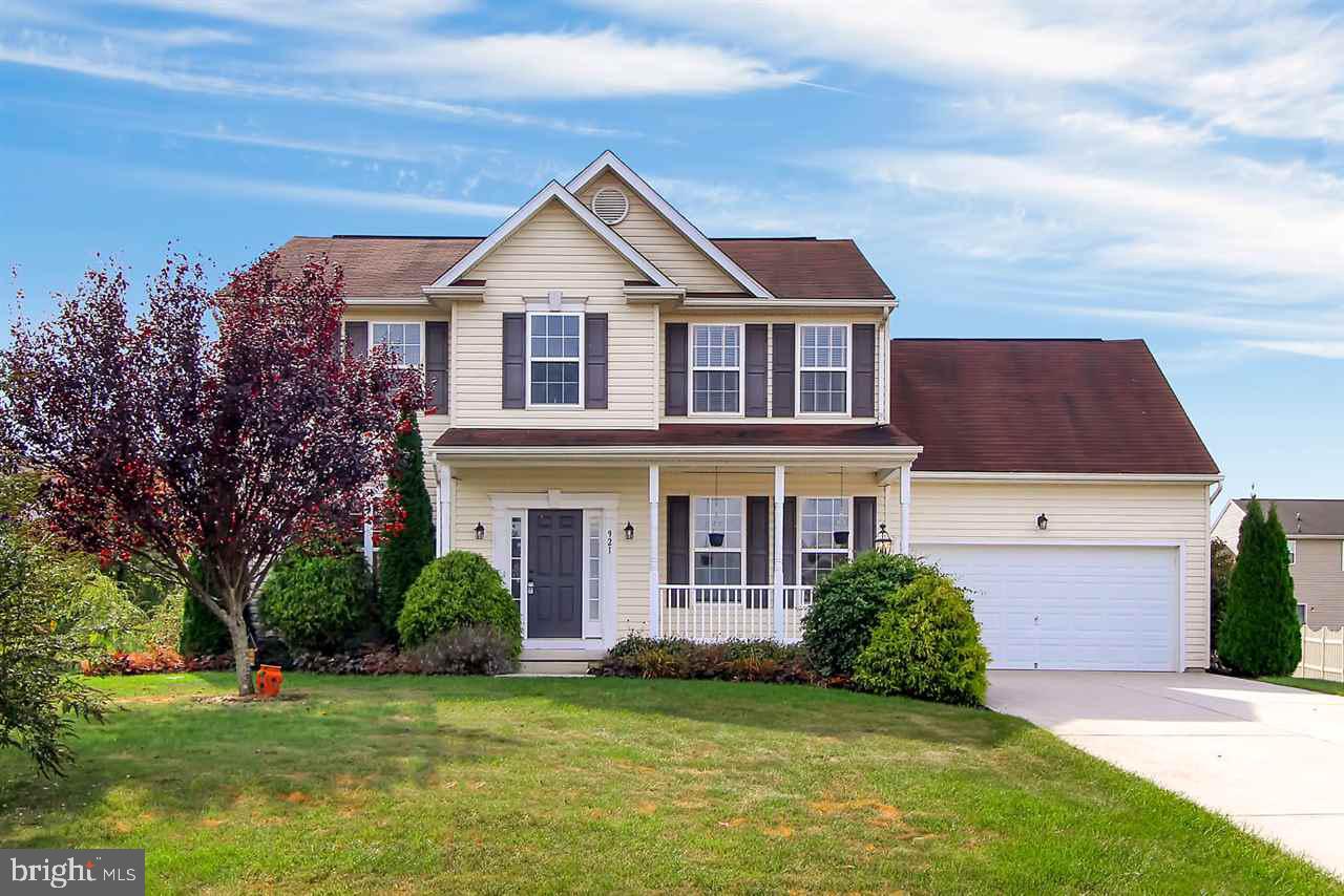 This beautiful colonial has all the features you want. Beautiful hardwood floors, granite counter tops, open stairway, stone fireplace in family room, and finished basement and more. Master suite has sitting area and huge walk in closet. Relax on the 14 x 26 rear deck with retractable awning. Great neighborhood and convenient to major highways. Nothing to do here, just move in and enjoy!