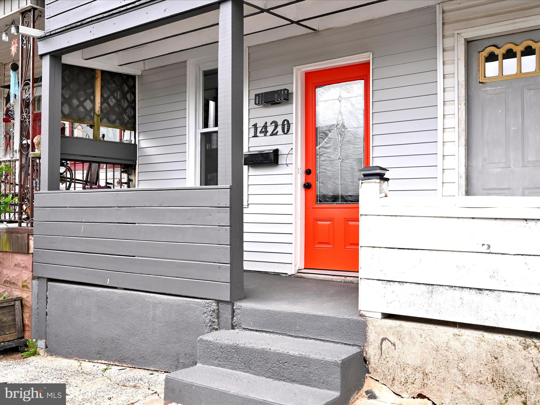 Fully renovated home in the heart of Ashland.  Enter through the lower level to find a finished area that can work as a bedroom, office, play area.  There is also laundry hook up and a half bath.  Ascend to the main floor to find a living room with tiled floors and access to a balcony area to relax with your morning coffee.  Or use this as the dining room and have the living room right off the open kitchen area that has plenty of cabinets for storage.  There is an exterior exit that leads to a covered porch and back yard  which is fenced and extends to the back street.  The floor has a front bedroom, a middle room which leads to the full bathroom with tub and shower and then a 2nd bedroom.   There is a third floor that has heat and needs a little finishing to make another bedroom and still have room for storage.  This unique floor plan has much to offer.  Come make it your own.