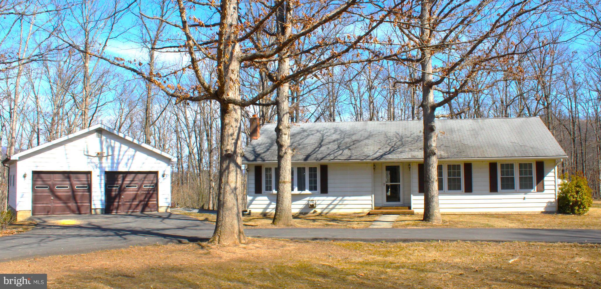 JUST WHAT YOU HAVE BEEN WAITING FOR - THIS IS A VERY NICE RANCH STYLE HOME ON OVER 1 ACRE - FEATURES A NICE LOT - PAVED CIRCULAR DRIVEWAY WITH EASY ACCESS INTO  A LARGE DETACHED 2 CAR GARAGE WITH AMPLE STORAGE - THE HOME FEATURES 2 FULL  BATHS - 3 NICE SIZE BEDROOMS - FORMAL DINING ROOM AREA - LARGE KITCHEN WITH LOTS OF CABINETS AND A BREAKFAST BAR - FAMILY OWNED FOR THE PAST 40 YRS -  THIS HOME IS A  GEM - NICE LOCATION CLOSE TO ALL AMMENITIES KEYSER HAS TO OFFER -  SELLERS PERFER TO SELL HOME FURNISHED BUT NOT AN ASOLUTE MUST - DO NOT MISS THIS HOME - LARGE CLOSETS - CENTRAL AIR - TRIPLE PANE WINDOWS - PATIO WITH A DECK - 2 DETACHED STORAGE SHEDS - KITCHEN LEVEL LAUNDRY.  REAR CORNER OF GARAGE NEEDS SOME REPAIR.  PROPERTY TAXES SUBJECT TO CHANGE WITH NEW OWNERSHIP.