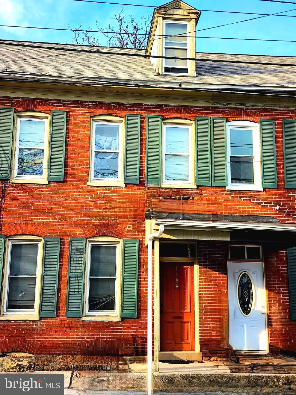 LOOKING FOR A GREAT INVESTMENT!  YOU WON'T BELIEVE THESE LARGE ROOMS!  COME SEE IT TODAY!  Wow!  This wonderful 4 bedroom home in Conewago Valley School district is HUGE!  If you are looking for large rooms throughout and 10 foot ceilings on the first and second floor, this is the place for you!  Beautiful woodwork throughout, as well as replacement windows, new roof, new gas meter, and a 2 car off street parking area.  Unique walk-way from the front of the house to the back features a brick-lined walk with a wooden ceiling.  Photos do not do this home justice.  Low taxes, inexpensive water, sewer, and trash make this an affordable home!  Don't miss your opportunity to spread out in this beautiful brick house.