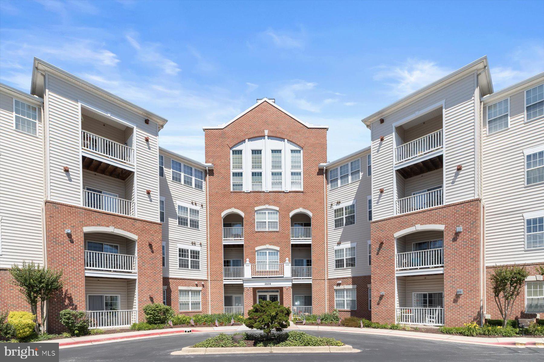Welcome to 2608 Chapel Lake Dr #204 in Gambrills, MD... a beautifully maintained 2-bedroom, 1 full and one half bath condominium offering the perfect blend of comfort, style, and convenience in a desirable, amenity rich, 55+ age-restricted community. This spacious residence features an open and inviting floor plan filled with natural light, generous living and dining areas, and a well-appointed kitchen designed for both everyday living and entertaining. The primary suite serves as a relaxing retreat complete with private balcony access, a walk-in closet, and an en-suite full bath. An additional bedroom and hall half bath provide comfortable accommodations for guests, family, or a home office. Additional features include in-unit laundry, a private balcony overlooking peaceful wooded views. This beautifully maintained home is like new, being freshly detailed with professional paint throughout and new high-end carpeting, creating a clean, modern, and truly move-in ready feel. Residents enjoy outstanding building amenities including a community room with a fitness/workout room, party room, kitchen, and meeting room. Conveniently located next to a shopping center with grocery stores, restaurants, movie theaters, and abundant shopping options, this home also offers easy access to Washington, D.C., Baltimore, and Annapolis, with BWI Airport just minutes away. Enjoy low-maintenance living with exceptional convenience in the heart of Gambrills.