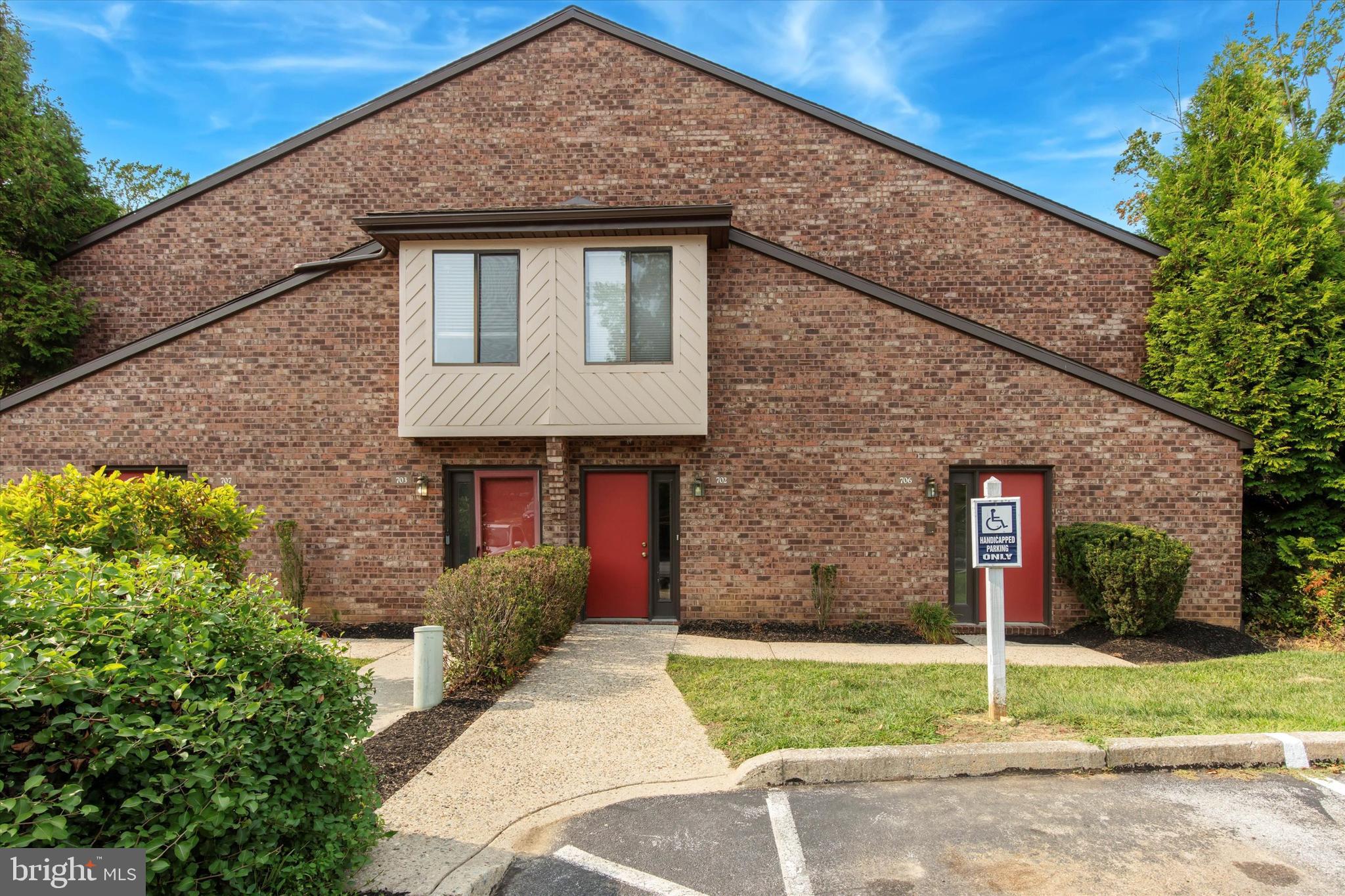 Welcome to 702 Mountainview Drive, a beautifully renovated first-floor unit in the highly sought-after Chesterbrook community. Offering two bedrooms, two full bathrooms, and the convenience of no steps, this move-in-ready home combines modern finishes with easy, low-maintenance living.

Thoughtfully updated throughout, the home features a stunning renovated kitchen with white shaker cabinetry, quartz countertops, and stainless steel appliances. The kitchen flows seamlessly into the dining and living areas, creating an open and inviting space perfect for everyday living and entertaining. For added convenience, the unit also includes a washer and dryer.

Natural light fills the spacious living room, where sliding glass doors lead to a private deck—an ideal spot to enjoy your morning coffee, unwind after a long day, or take in the peaceful surroundings.

The primary suite serves as a comfortable retreat, complete with two closets and a beautifully updated ensuite bathroom featuring a glass-enclosed shower. A generously sized second bedroom and renovated hall bathroom provide flexible space for guests, a home office, or additional living needs.

Additional updates include a newer HVAC system installed in 2022, providing comfort and peace of mind for years to come.

Located in the award-winning Tredyffrin-Easttown School District and just minutes from Wilson Farm Park, major commuter routes, shopping, dining, and all that the Main Line has to offer, this exceptional home offers the perfect blend of style, comfort, and convenience.

Simply unpack and enjoy-702 Mountainview Drive has already been beautifully updated for you.