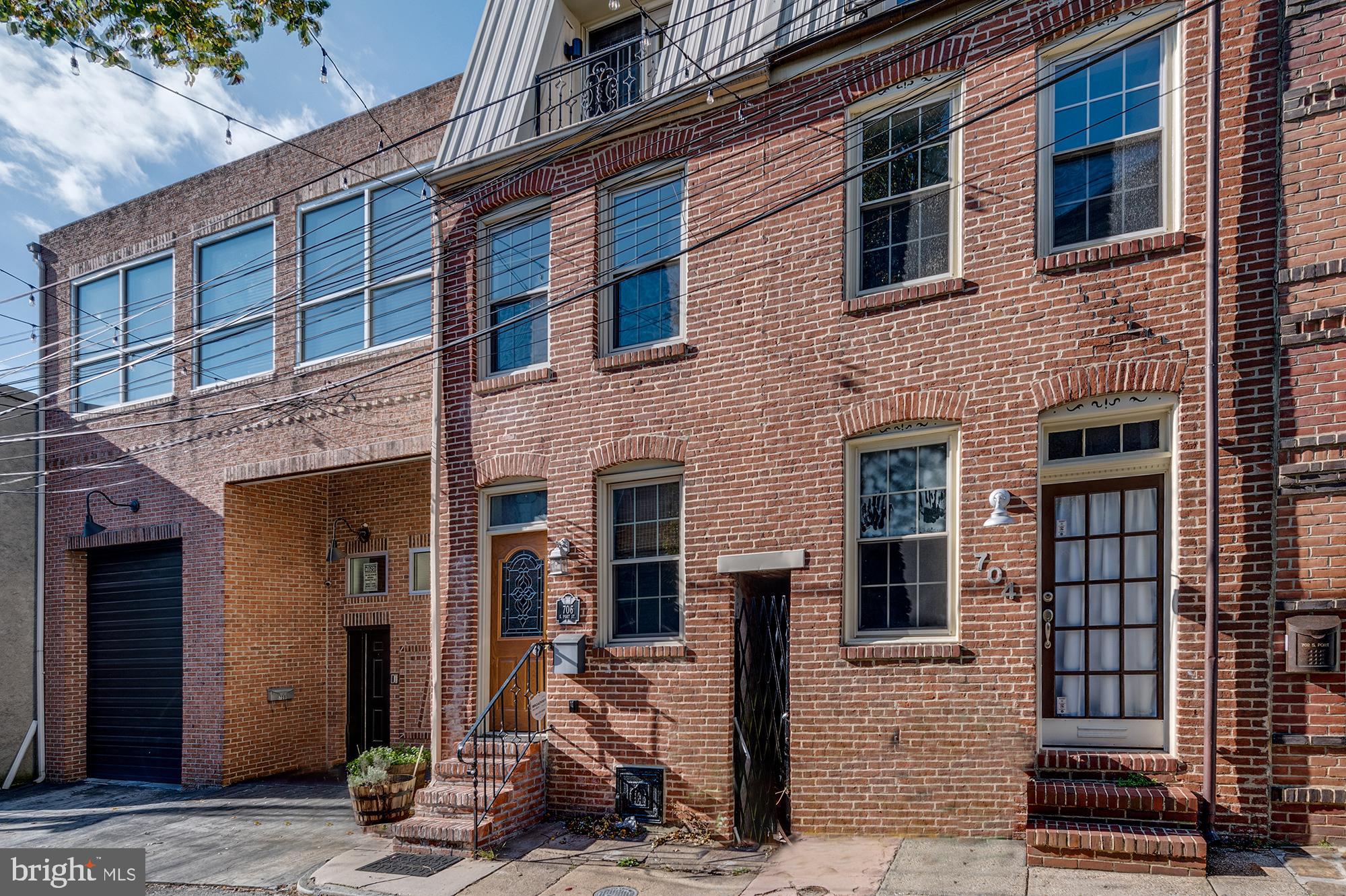 Amazing opportunity to own a 3 level renovated home in Canton proper. The home was uniquely renovated, boasting attention to detail and customization such as custom railings, tray ceilings, hardwood floors, multiple decks, and more.  First level features a living room, large galley kitchen, powder room and a separate dining room, with a walk out to the patio. Second floor offers 2 large bedrooms with a walk-out balcony and two bathrooms. Top level is its own master suite with a spacious bedroom with another private balcony and a large bathroom with a soaking tub, separate shower, double vanities, and another walk-out balcony. Located perfectly in the heart of Canton, minutes from waterfront, Canton Square, Fells Point, Harbor East, Johns Hopkins.