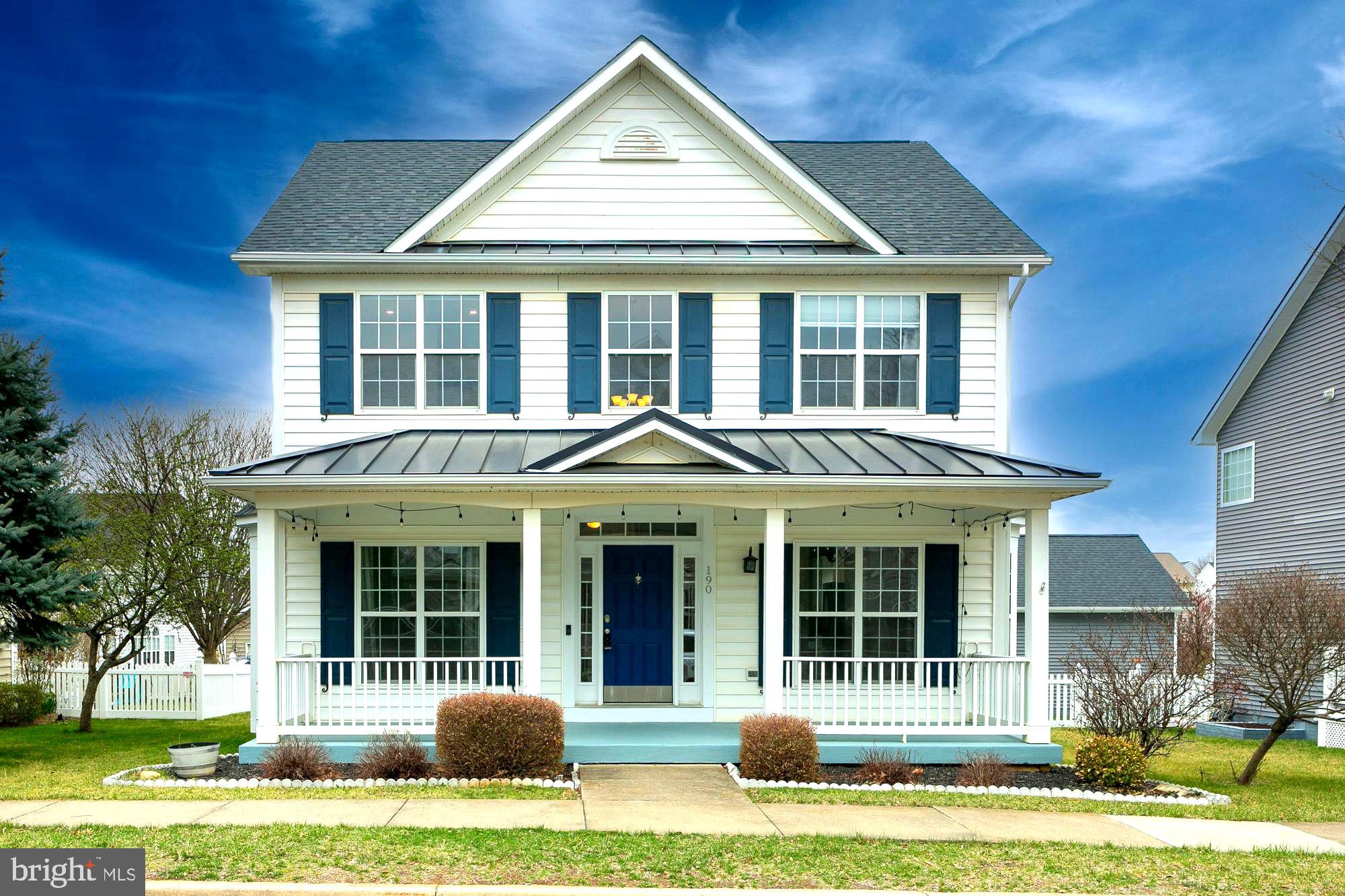Welcome to this beautiful 3-bedroom, 2.5-bathroom home in the desirable Huntfield community, offering just over 2,000 sq. ft. of thoughtfully designed living space.  Step onto the charming front porch before entering the home.  As you step inside, you're greeted by a bright and welcoming foyer, highlighted by hardwood floors and a stunning wood staircase that serves as a striking centerpiece.  To the left and right, you'll find the formal dining room and formal living room. Moving toward the rear of the home, a powder room is conveniently located along the hall.  Flooded with natural light, the back of the home features an oversized kitchen with ample counter space, a kitchen island, and upgraded stainless steel appliances. The spacious family room, located just off the kitchen, boasts wood floors and a propane fireplace, creating a warm and inviting atmosphere.  Upstairs, the primary suite is a true retreat, offering abundant natural light, a walk-in closet, and an ensuite bath complete with double sinks, a stand-up shower, and a soaking tub. Two additional nicely sized bedrooms, an updated full bath, and a laundry room complete the second floor.
Step outside to enjoy the large rear deck, perfect for outdoor gatherings. A detached 2-car garage in the rear of the home offers additional storage and parking. The unfinished basement provides a blank slate for the new owner’s vision.  Additional upgrades include an electric HVAC system and hot water heater, along with a whole-home surge protector for added efficiency and peace of mind.