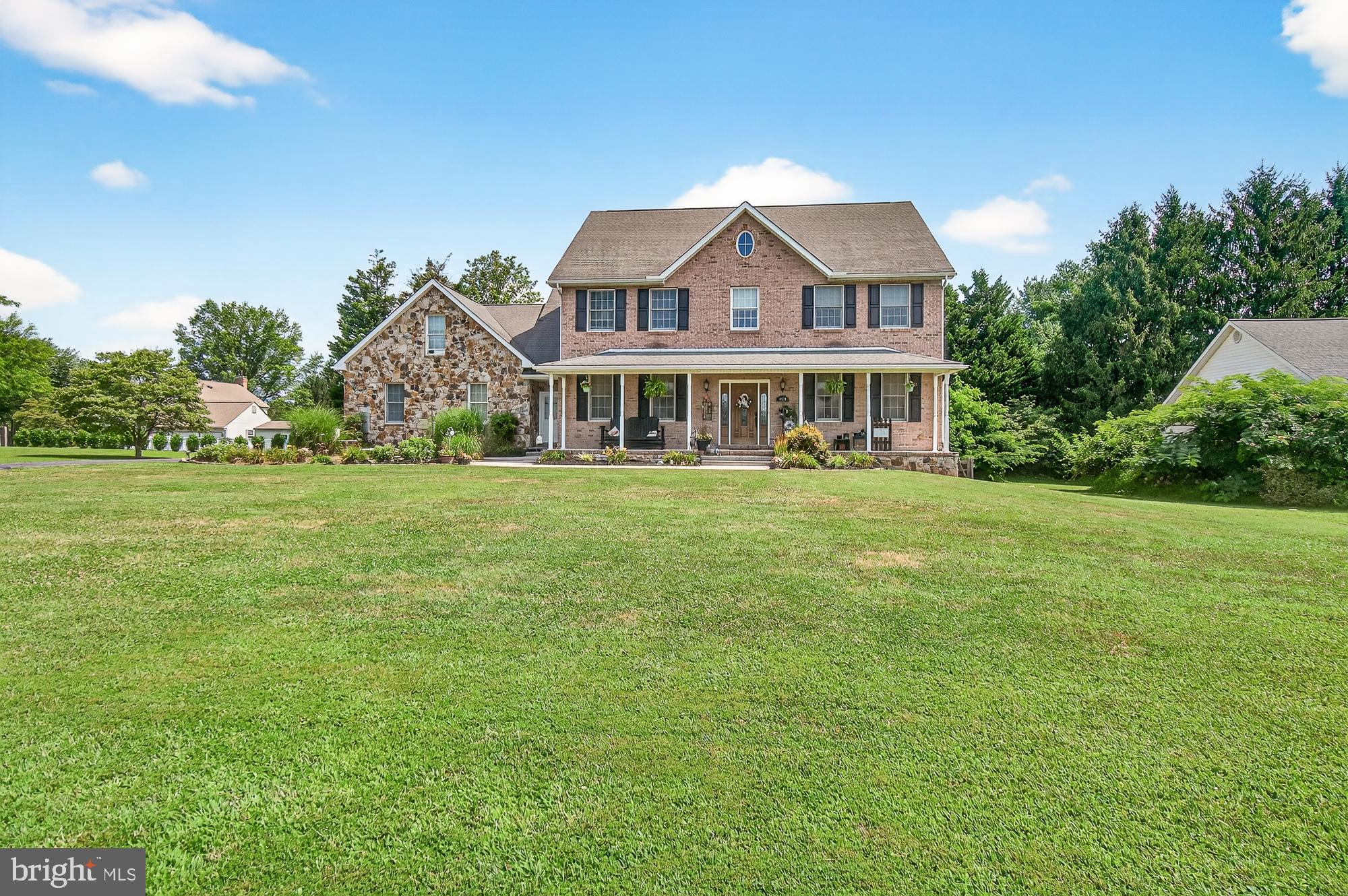 Welcome to this stately brick-front Colonial offering 4 large bedrooms and 3.5 baths, set on a generous .57-acre lot. Boasting over 5,100 total square feet—with 3,532 finished above grade and an expansive unfinished lower level with a rough-in for a full bath—this home delivers both space and potential.
Step inside to find White Oak hardwood floors throughout the main level, creating a warm and timeless ambiance. The open floor plan seamlessly connects the living, dining, and kitchen areas, perfect for both entertaining and everyday living. The gourmet kitchen is a chef’s dream, and the home features two separate staircases providing convenient access to the upstairs bedrooms.
Enjoy year-round comfort with dual-zone heating and air conditioning and take advantage of outdoor living with a patio off the kitchen that includes a beautiful stone fireplace—ideal for relaxing or entertaining under the stars.
This home offers a rare combination of space, style, and future expansion potential in a highly desirable setting.