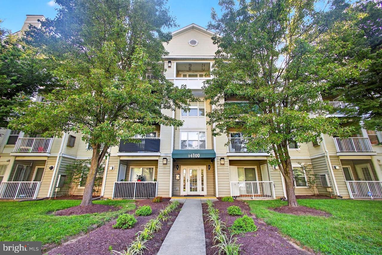 Motivated Seller!!! Come Experience this charming two-bedroom, two-bathroom condominium featuring a cozy fireplace, and a spacious walk‑in kitchen! Beautiful hardwood floors run throughout the home, and the included washer and dryer make this condo even more special. Don’t miss this opportunity — it won’t last! Enjoy your own personal garage with direct access into the building, so you never have to worry about a rainy day.    This amazing home also comes with one parking space with a parking pass. Carpeted hallways and an elevator add comfort and convenience, making this condo truly feel like home.  Home Warranty will convey for the new owner. Make your offer today!