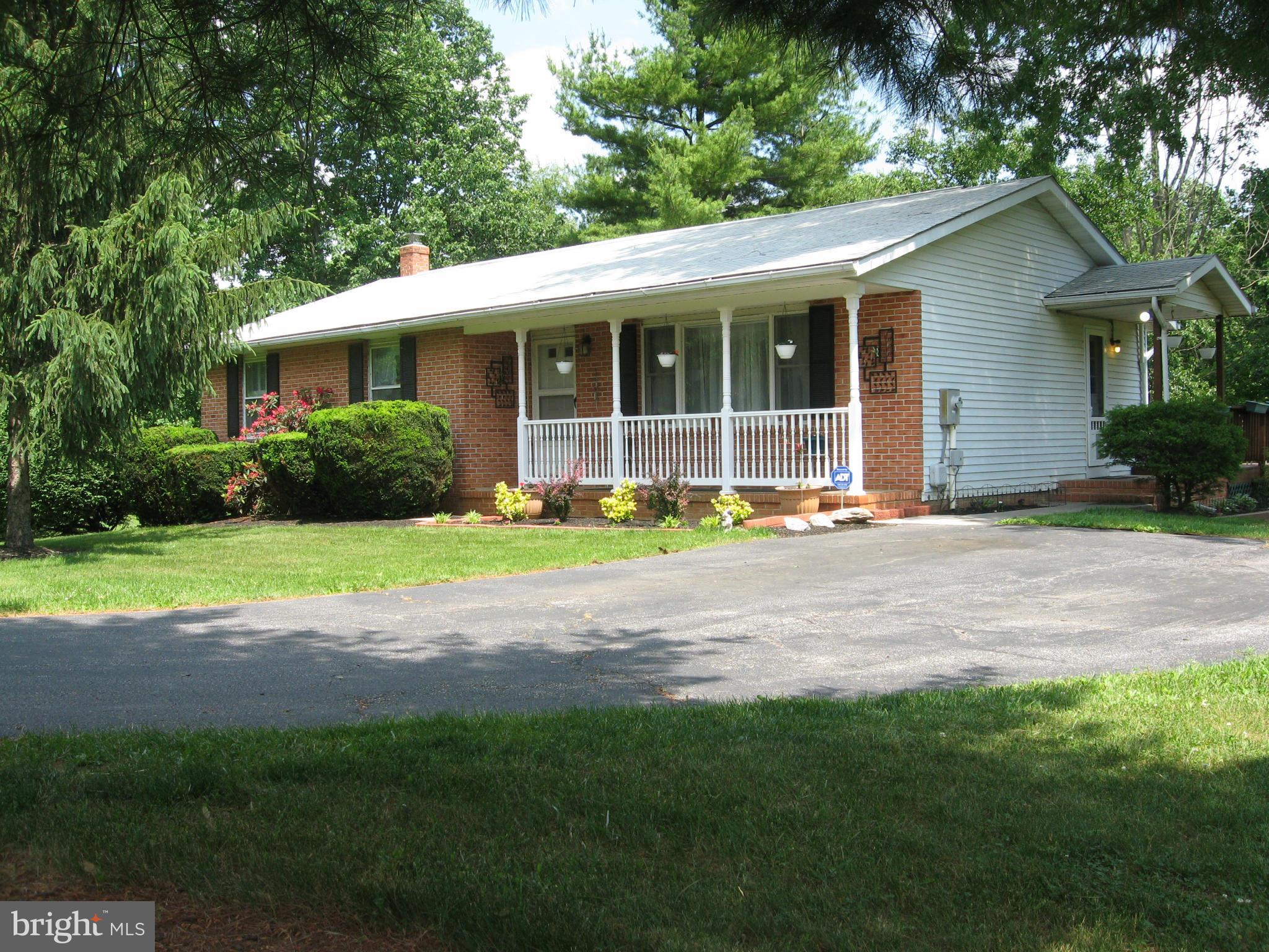 Motivated sellers have reduced the listing price of this rancher in a small community near Westminster. Huge master BR, 2 1/2 baths,beautiful HW floors on main level Finished LL, wrap around deck overlooking private yard. Florida room off DR, Open living room & dining room. Large kitchen with plenty of counter space & cabinets. All appliances, riding lawn mower & pool table  can convey.