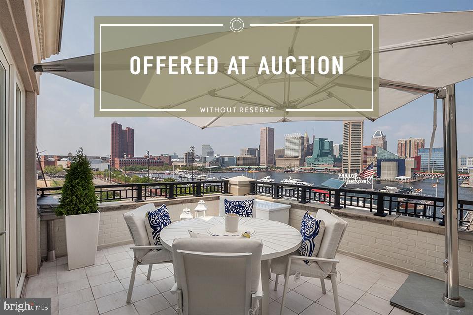 No Reserve Auction to be held on-site, Saturday, December 12th, 2020, at 11:00 AM.  Starting, Saturday, November 21st, 2020, previews every Saturday & Sunday 1:00 PM-4:00 PM by appointment, Private appointments available, Call for details.  Do you covet style, intelligent design and functional beauty? Formerly the home of beloved New York Times Best Selling Author, Tom Cla.ncy, this 4BR/5.5BA Ritz-Carlton penthouse embodies this rare, and illustrious fusion of luxury and efficiency. Created over the course of two years at a cost of over $15 million dollars, three penthouses were successfully combined to reflect exquisite tastes and quality craftsmanship, creating the ultimate 12,000 sqft  Ritz-Carlton Penthouse.  Inspiring and exceptionally modern, the home demonstrates an appreciation of the finer things in life. Designed for entertaining, the open floor plan, custom elements, spacious rooms, and high 10  ceilings throughout welcome guests to an incomparable living experience. Exploring the penthouse, one enters via the expansive foyer opening into a lavish gallery space. Discover a prodigious 1,500 sqft living room boasting breathtaking water and skyline views, and a dining doom capable of hosting dozens of your closest friends and associates. Whether enlisting the assistance of a professional chef or exercising your culinary muscles, the sleek and glistening gourmet kitchen has top-of-the-line Viking and Sub-Zero appliances to ensure your coq au vin or duck confit pairs perfectly with your favorite vintage wine. Later in the evening, enjoy an award-winning motion picture with friends and family in the premium home theater. Retire to the massive master bedroom with spacious sitting areas, two glamorous en suite baths, and enclosed and fully custom walk-in closets and dressing areas. Holistically designed, the comprehensive in-home gym provides an area dedicated to healthful living. Whether a seasoned executive seeking temporary refuge or a writer in need of a muse, reflect in a sequestered office featuring custom bookshelves and private access to a patio with harbor and city views. For ample and complete convenience, full home automation for lighting, shades, blinds and sound may be controlled from throughout the residence or through an easily downloaded smartphone app. Additional residence features include 5 parking spaces, an elevator from garage to private vestibule, panoramic views of The Inner Harbor, Harbor East, Fells Point, Federal Hill and Downtown city skyline, two offices, four balconies and two corner terraces. Not only is this penthouse the most impressive and opulent home in Baltimore, the 190 resident building is equally as extraordinary. Situated on a 5-acre premier waterfront parcel along Baltimore s Inner Harbor, The Ritz Carlton Residences has five-star amenities including 24/7 front desk attendants, two acres of waterfront gardens with fountains, Ritz-Carlton trained concierge, free valet parking for residents and guests, meditation garden with a waterfall, exceptional security with 88 cameras surrounding property, dry cleaning pickup and delivery, available maid service, six residential suites for resident guests, and porters to deliver groceries and packages directly to residences through service corridors. Complimentary access to the amenity rooms is also granted for residents, which includes the game and billiards room, resident lounge, 30 seat resident theater and the board room! Start Living the Good Life Today! Call now to schedule your private and exclusive tour of The Ritz-Carlton Penthouse!