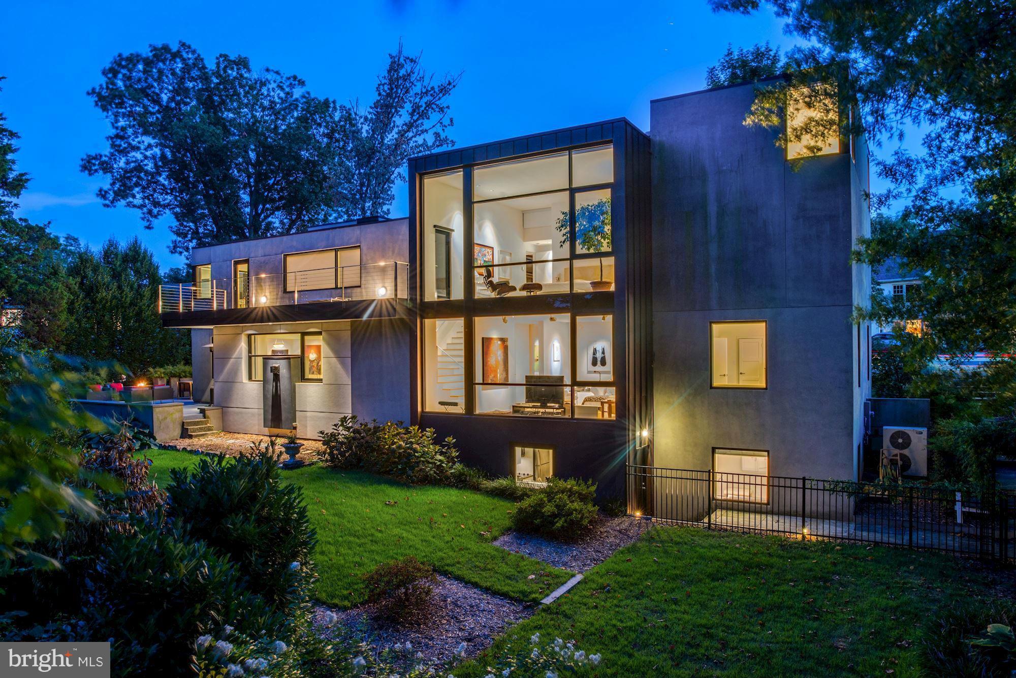 HOLLYWOOD GLAMOUR IN DC! THIS IS THE HOME WHERE YOUR DREAMS BECOME A REALITY! Award-winning design by  starchitect  David Jameson + expert craftsmanship throughout this 5000SF+ modern masterpiece! Open, light-filled indoor/outdoor living w/soaring ceilings. MB dressing room fit for a movie star. Massive double lot, lower level 2BR/1BA apartment w/full kitchen + laundry, 2 car garage + much more!
