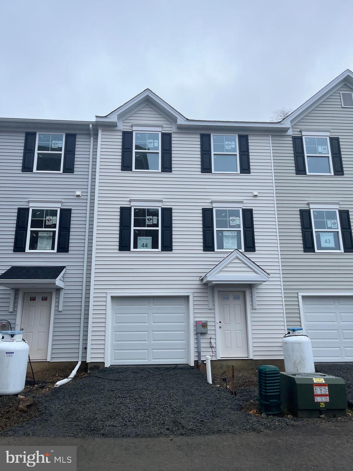 Welcome to this newly built townhome in the charming community of Mt Penn, PA. This spacious 3 bedroom, 2.5 bath home offers modern living at its finest. The open concept floor plan seamlessly connects the living, dining, and kitchen areas, creating a perfect space for entertaining. The kitchen boasts sleek countertops, and ample storage. Upstairs, you'll find a luxurious primary suite with a private bath and walk-in closet, along with two additional well-appointed bedrooms and a shared full bath. The attached 1 car garage provides convenience and extra storage space. Located in a desirable neighborhood, this townhome offers easy access to local amenities, parks, and schools, making it an ideal choice for anyone seeking a comfortable and contemporary living experience.