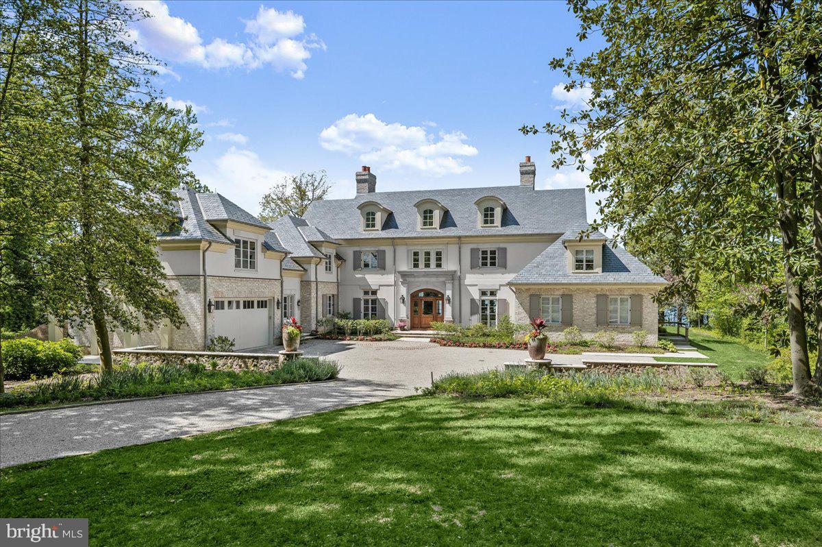 A newly constructed, custom, waterfront, simply spectacular Magothy River property on private secure Gibson Island awaits its new owners. Designed by highly regarded Vincent Greene Architects, this stunning, beautifully constructed four level French Provincial style home was built with only the finest materials by top tier builder, Lynbrook of Annapolis. Encompassing more than 12,000 square feet, and completed in 2020, this six-bedroom, six full bath/four half bath property includes a chef’s dream kitchen with two pantries, a large, screened porch, a great room, and den. Two large bedroom suites are on the main level. There are three woodburning fireplaces, one of which is in the kitchen and can be used as a pizza oven. A second front entrance opens to a mudroom with custom lockers and directly accesses the oversized garage. In addition to four bedrooms, the second level includes an upstairs library with secret door entrances to the bedrooms on either side, an office, a laundry room, and a substantially sized loft that would make a fabulous studio or hang-out room. On the lower level is a movie theater with stage, a gym, wine cooling area, and large rec room. Located on a quiet street on the backside of the Island, and offering daily jaw-dropping sunsets, this gorgeous home is situated on a beautiful one-and-a-half-acre private lot. Designed for year-round living, it would also work well as an additional residence.  
Please make sure to view the photographic tour of this property.   
Please note that there is a yearly credit of $4,694 by the HOA due to an overpayment to Anne Arundel County in the property taxes for the SCBD --more information available upon request. 
Floor Plans available upon request. 
Information on Gibson Island:
Gibson Island is a private island within one hour of Washington, D.C. and Baltimore offering an absolutely extraordinary setting.  The Island comprises 1000 acres with seven miles of shoreline. Two thirds of the Island is undeveloped and is owned by the Gibson Island Corporation, the homeowners' association.  The remaining third is residential home sites.  The Island is located on the western shore of Maryland, so there is no need to cross the Bay Bridge. On the Island is a 43-acre spring fed freshwater lake in which one may enjoy non-motorized watercraft activities such as paddleboarding, canoeing, kayaking, fishing and swimming.  
Gibson Island offers enormous privacy and security--there is an entry gatehouse staffed 24+Hours and the Island is patrolled by the Gibson Island Police Force (GIPD).  The Gibson Island Corporation Service Department offers yard maintenance and landscaping and other services for homeowners.  There is a full-service yacht yard.   From the Island, it is just a 20-minute drive to BWI Airport and the neighboring Amtrak train station.  
The Island houses a private country club (membership by invitation) offering yachting, fine dining year-round, tennis, an award-winning Charles Blair Macdonald designed 9-hole golf course, swimming, croquet, skeet shooting, and more.   (C)