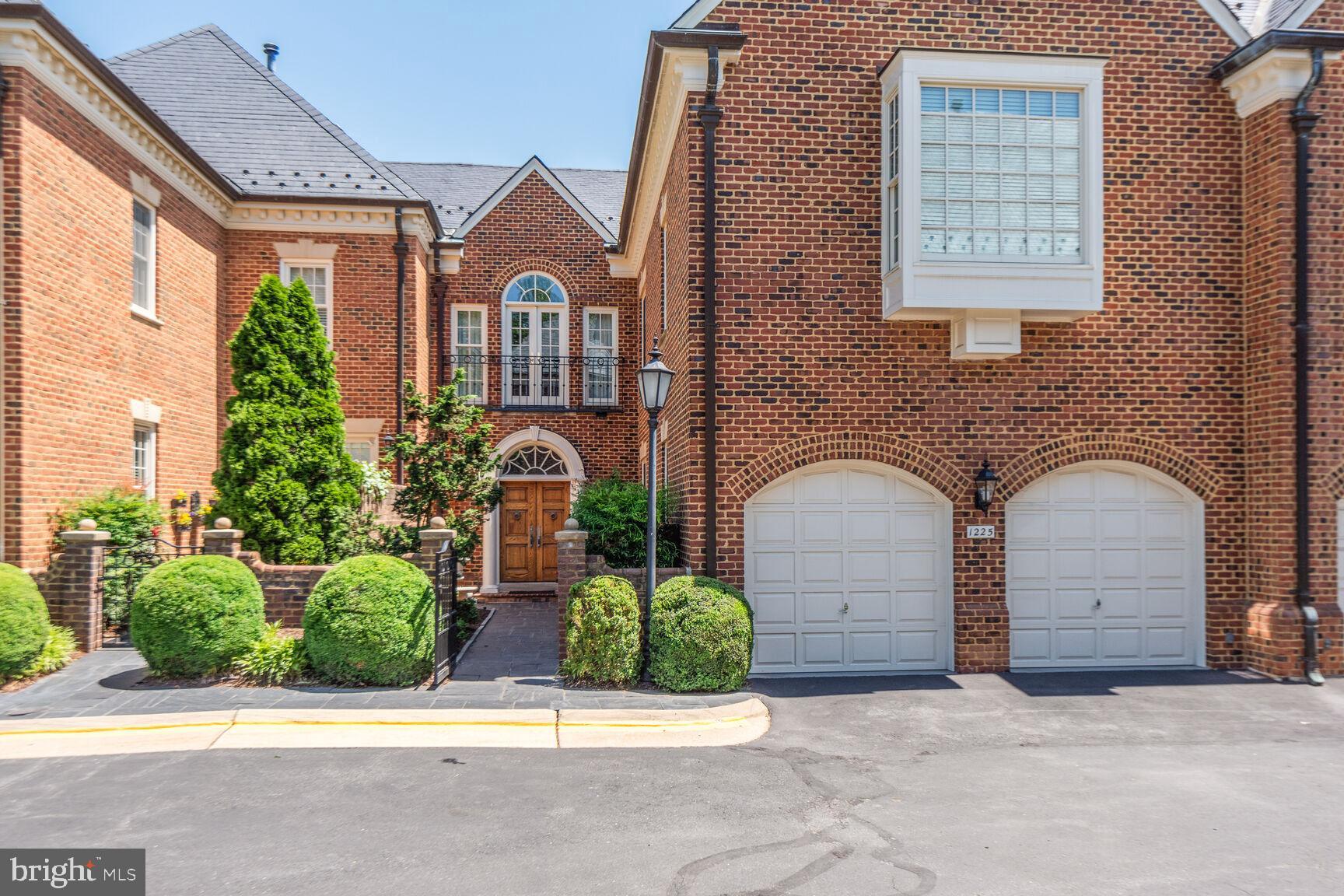 *NEW PRICE!  DON'T MISS THIS OPPORTUNITY! * Set in the heart of McLean’s sought-after Merryhill neighborhood, this meticulously renovated Georgian-style Flemish bond brick townhome combines timeless elegance with modern luxury. Spanning over 5,550 square feet across three beautifully appointed levels, this 3-bedroom, 4.55-bath home features stunning craftsmanship, exceptional upgrades, and an abundance of natural light throughout.  ***


*** From the inviting front courtyard with the flagstone front walk with landscape uplighting to the slate roof and copper gutters, every detail of this residence exudes charm and sophistication. The open, airy floor plan is perfect for both everyday living and entertaining, with a grand two-story entry foyer, a spacious living room with a cozy wood-paneled fireplace and French door with arched windows, and a generously sized formal dining room. Extensive millwork adds character and refinement to every room. ***

*** The chef’s dream kitchen is a true highlight, featuring Brazilian quartz countertops, a glass tile backsplash, and top-of-the-line stainless steel Thermador six burner gas range with convection oven and Jolasco range hood, Thermador dishwasher, 48" Kenmore Pro counter depth refrigerator and KitchenAid wall over and built-in microwave. The kitchen also includes an island with sink and seating, an eat-in area with a custom chandelier, and a spacious pantry. A convenient 501 Kangen Water Ionizer ensures fresh, pH filtered water at your fingertips. ***

*** The luxurious primary suite offers a sitting area with built-ins, a wood-burning fireplace, box bay window with built-in bench seating, cathedral ceiling, dressing area with six closets, and a beautifully renovated spa-inspired bath with heated marble floors, cathedral ceilings with skylight, a glass-enclosed shower with marble basketweave tile floor, marble benches, three shower heads, and dual vanities with marble tops. Each of the generously sized secondary bedrooms has its own private stunning renovated bath with marble tile, multiple closets with custom closet organizers, and French doors with Juliet balconies. Convenient upper-level laundry with front load washer and dryer, utility sink, and cabinet storage. *** 

*** The lower level is perfect for relaxation and entertainment, with a walk-out family room featuring a wood fireplace, built-in bookcases, and a renovated powder room. A den/Au pair suite with French doors and access to a renovated full bath adds extra versatility. *** 

*** Outdoor spaces are equally impressive, with a professionally landscaped garden, brick privacy wall with arched gate, flagstone patio, gas fire table, and a spiral staircase leading to the main level. Two-zone HVAC, whole-house central vacuum, and state-of-the-art home automation systems with Sonos, Network wiring, and built-in speakers complete the residence. *** 

*** The two-car garage features pristine epoxy flooring, storage cabinets, new doors, new openers, new lighting, and an electric car charger. ***

*** Conveniently located within walking distance to downtown McLean’s shops and restaurants, and just minutes from Tysons Corner, I-495, and the Metro Rail, this home offers the perfect combination of luxury, comfort, and location. *** 

*** The owners have taken special care of this home. Renovation dates include: Windows and French doors 2022 * Upper level Carrier Heat Pump 2020 * Lower level Lennox Gas HVAC 2017 * Two 74 Gallon Gas State water heaters 2021 * New Central Vacuum 2020 * Garage doors, Garage door openers, Garage lighting 2022, Kitchen renovation 2014, Primary bath renovation 2014, Secondary bath renovations 2014, Lower level bath renovation 2016.