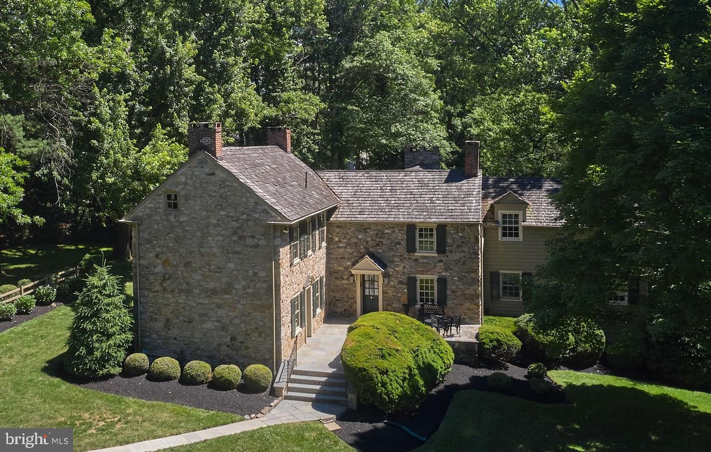 3257 Edison Furlong road,  a stone house which is one of the first houses built in Furlong Pennsylvania in beautiful Buckingham Township. The historic Federal-style home is currently centered on 7.98 acres. Originally a Dairy farm in the 1700's the property was carefully restored by the current owners and is now being offered for the first time in over 50 years.
The home features 4 bedrooms and 2.5 baths along with Key architectural elements, including the original stone structure, cedar shingle roof, original stone sink, six-over-six windows, oak ceiling beams, pine floors, plastered walls, soap stone counter tops, and paneled woodwork, along with additional extensive custom woodwork throughout the home. During the restoration, attic boards were repurposed as floorboards in certain sections on the main level, adding to the home's character and authenticity. Every detail was considered during the restoration. The original stone structure has been thoughtfully expanded with wood frame additions, preserving its historical integrity.
Registered with the Bucks County Heritage Conservancy, the home has a unique charm enhanced by the original Wagon house, which has been converted into a three bay Garage.
The property boasts mature trees and gardens in a park-like setting, offering tranquility and natural beauty. The in-ground pool adds a modern touch, making this home perfect for both relaxation and entertaining. 
The location combines privacy with convenience as the house is set more than 300 feet back from the road, providing a serene environment while being close to modern amenities. The property is just 8 minutes from Doylestown Hospital, 6 minutes to the center of Doylestown, 12 minutes from Wegmans in Warrington, an hour from Center City Philadelphia, and just under 2 hours from New York City.  The  property is located in the highly coveted Central Bucks School district.

With its rich history, charming details, and modern comforts, the property offers a rare opportunity to own a piece of Furlong’s heritage as It provides the perfect blend of historical significance and present day living, ideal for those seeking a unique and storied home.