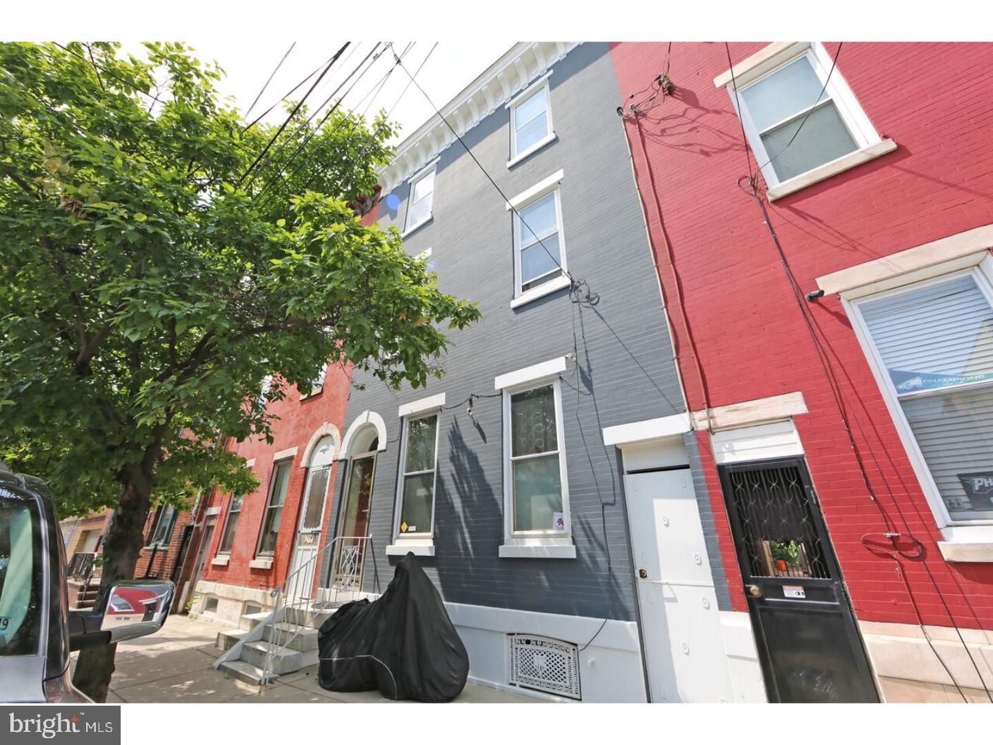 Do you want a big house then Here it is, your next home located in Port Richmond, a bustling area in the midst of change. Are you looking for a home with some old charm and some modern looks to it. Then look no further as this home will embrace you with both. Walk through the front door and you will enter into the vestibule. Walk on through and see your quiet living room area behind the glass door and you will notice the original plank flooring, high ceilings, lovely crown moulding and a stunning marble mantle. The Formal Dining Area offers 10'ceilings, a custom display mantel, original wood flooring and large oversize windows for loads of natural light. The large custom gourmet kitchen offers plenty of natural clear Maple cabinets, center island with prep-sink and stainless steel appliances. You will love the room off the kitchen with the cathedral ceiling, gas fireplace and great sunlight that shines through. You have so many options with this room. The outdoor space will make you seem like you are not in the city. You will enjoy many days and nights in this sun filled by day and moonlit by night area. As you move your way to the second floor you will be amazed at the size of the front bedroom, with top grade laminate flooring and all the storage it provides. You will find a 3 piece bath, a separate second floor laundry area and then another huge bedroom with an exposed brick wall, walk in closet and its own bath. We are not done yet. On the third level boasts a lovely sized room with hardwood floors, and plenty of natural light shining through. There is an amazing amount of space. If you would like even more additional space the full sized basement with high ceilings can easily be finished. There is also a newer heating unit and hot water tank. Get in the Port Richmond area now as the boom has started. Buy now before the prices continue their climb.