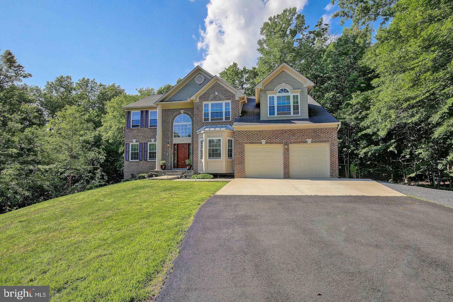 Welcome to this stunningly beautiful colonial home situated in a cul-de-sac, with a 100 ft driveway and an HOA maintained Pond to the left of your front door. The home featuring 4 bedrooms, 3.5 baths with hardwood floors throughout and a formal living room, dining room and sun room off the gourmet kitchen. The upgraded kitchen features a island with granite countertops and stainless-steel appliances.  From the kitchen you can walk through the double french doors into a beautiful sun room or walk into in a massive great room off the kitchen while enjoying the cozy fireplace. Working from home is easy in the first-floor office/den/study.  The stunning oversized owner’s suite features a sitting area, double walk-in closets, and en-suite bathroom with large soaking tub and separate shower. The finished basement has plenty of room for family fun. Two rear decks and of course, a spacious two car garage. 6 miles to Joint Base Andrews, 13 miles to National Harbor, and the Beltway, 3 miles to Med Star hospital, 38 Miles to NSA, 36 Miles to Fort Meade, 26 miles to the hart of Washington D.C.