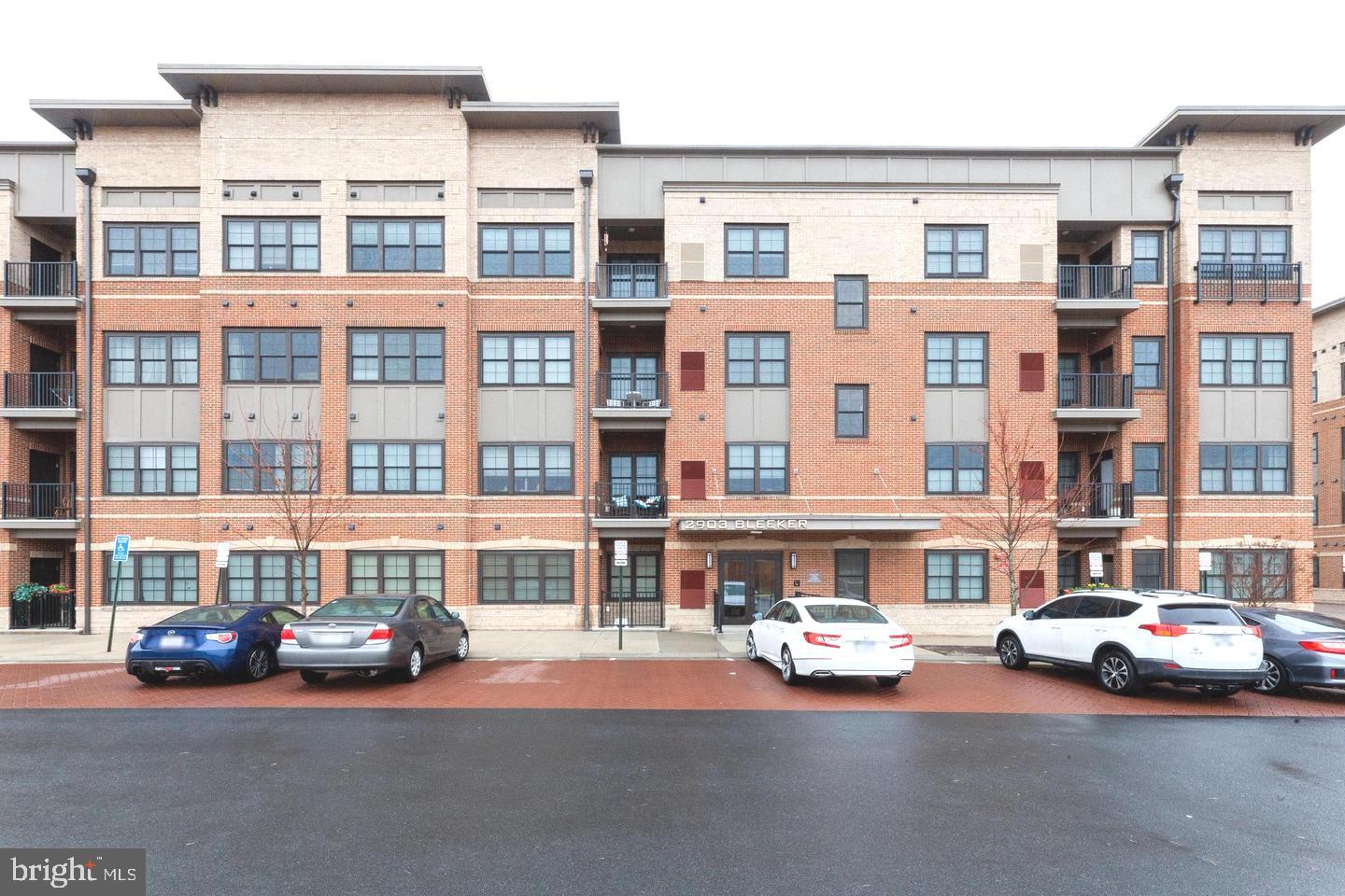 Stunning 2 bed/2 bath condo in the heart of Vienna, just steps from Vienna/Fairfax Metro Station! This unit is open floor plan with spacious living/dining areas, plenty of windows that bathe the home with natural light. Gourmet kitchen features granite counters with breakfast bar seating, dark maple cabinets, stainless steel appliances, and hardwood floors. Primary suite features walk in closet and luxury en-suite bath. Enjoy the spacious balcony overlooking the neighborhood! This is a fob- secured building which includes elevator access, 2 assigned underground garage parking space and outside parking spaces. Amenity access to the Providence Community Center's gym/fitness center, game room and more. Commuter's dream location! Quick access to routes 29, 495 and 66!