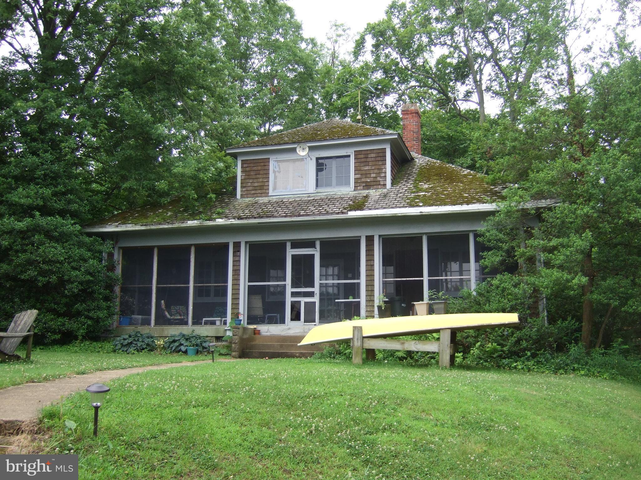 Prime waterfront location on the Severn River. Property sold as-is, value in the land.