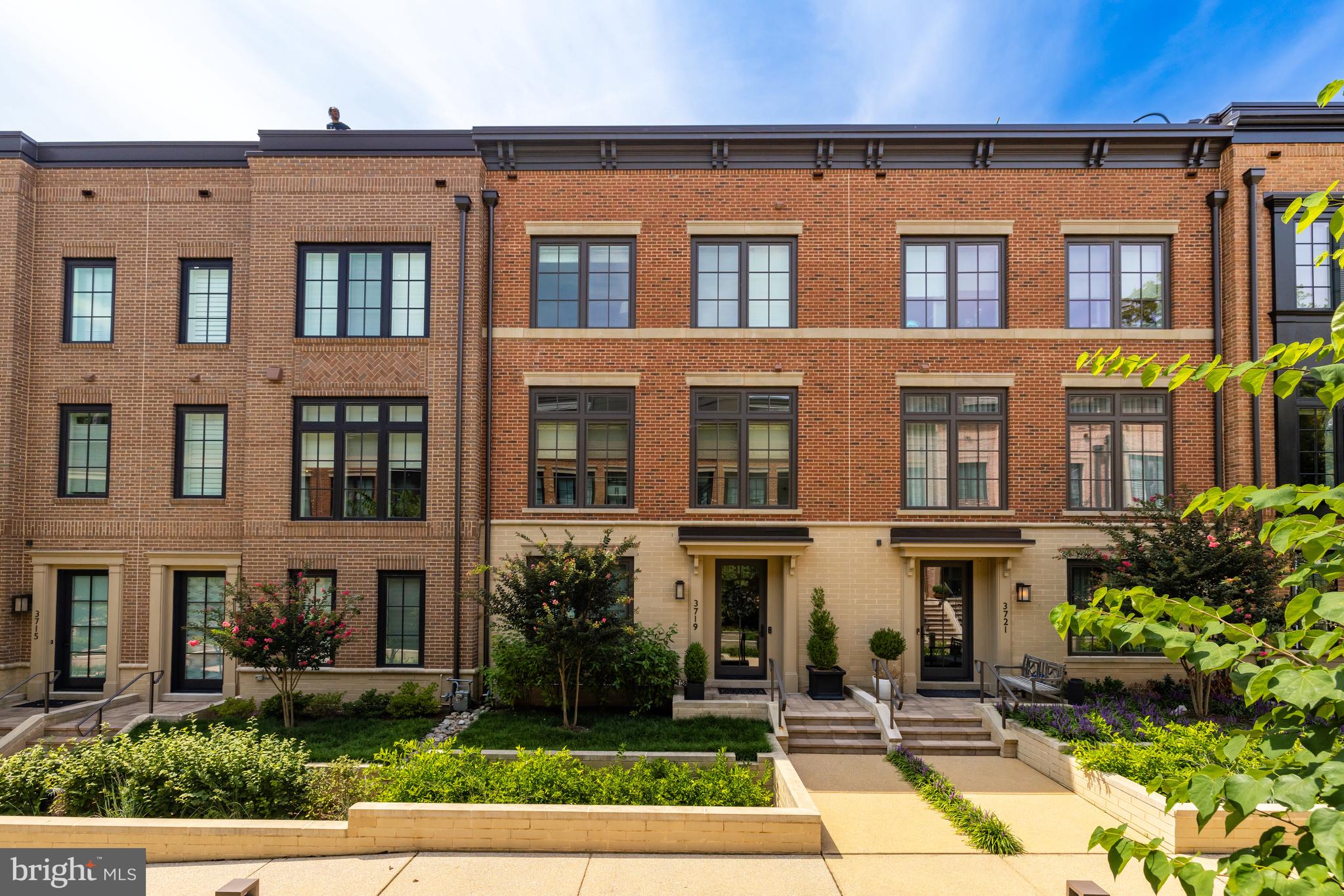 New price! Better than new!  Builder and owner upgrades will delight even the most discerning buyers!  Centrally located in the coveted Chevy Chase Brownstone neighborhood, 3719 Chevy Chase Lake Drive is an exquisitely appointed and timelessly curated EYA Brownstone offering unparalleled townhome living with all the conveniences of an urban lifestyle. Sited in close proximity to the dining and shopping destinations of Chevy Chase Lake including The Ritz-Carlton Residences, Amazon Fresh, CVS, restaurants, exercise, shopping and more!  Close to downtown Bethesda, the Capital Crescent Trail, and neighborhood amenities, this incredible offering truly has it all!

Boasting 3,600 total square feet, this 4 Bedroom, 4.5 Baths residence features sprawling open concept living spaces highlighted by gleaming hardwood flooring, numerous windows with custom mechanical shades, custom built-ins, and soaring 9’+ ceilings. Also, it offers an elevator that services all levels. The principal entertaining spaces are located on the Second Level and feature a Living Room with a marble surround gas fireplace open to the Dining Room, Family Room, and Kitchen. The Gourmet Kitchen has been meticulously maintained and is sure to delight any caliber chef with granite countertops, frameless designer cabinetry and stainless steel appliances with custom panel covers. Access to the Second Level balcony is available through the Kitchen and Family Room and is the perfect setting for your morning coffee or grilling for dinner.

The Third Level holds the spacious Primary Suite complete with two fully outfitted walk-in closets and a spa-like Primary Bath with dual vanity, heated floor, and stall shower. An additional en-suite Bedroom with a walk-in closet and a conveniently appointed Laundry Room are located on the Third Level. 

The Top Level hosts a third Bedroom with full bath and an expansive Family Room with a built-in media center. The Family Room offers direct access to the gem of this priceless brownstone, the breathtaking Rooftop Terrace. Showcases a Wet Bar, Gas Fireplace, and remarkable treetop vistas, you’ll never want to leave this private oasis! 

The First Floor/entry level features a Bedroom with an en-suite full bath and offers direct access to the attached 2-Car Garage to complete this exquisite property’s offerings.