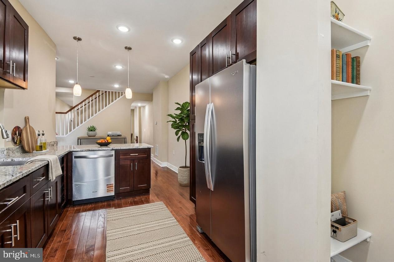 Price Improvement!  Thoughtfully upgraded, this stunning brick-front townhouse offers the perfect blend of historic charm and modern comfort in Baltimore’s vibrant Oliver neighborhood. A home warranty is included for added peace of mind.
Featuring 2 bedrooms and 2.5 baths, the home showcases classic Baltimore character with iconic marble steps, decorative brick fireplaces, and intricate architectural details throughout. Inside, gleaming hardwood floors, recessed lighting, and a striking half-circle arched hallway create a warm yet refined atmosphere. The open staircase overlooks a formal dining area that flows seamlessly into a fully equipped kitchen complete with Whirlpool stainless steel appliances, tall soft-close cabinetry, sleek countertops, a breakfast bar with pendant lighting, and a built-in wine rack.
Upstairs, the spacious primary suite offers a spa-inspired bath and walk-in closet, while the second bedroom provides generous space for other occupants,guests or a home office. A conveniently located upper-level laundry closet adds everyday ease and convenience.
Step outside to enjoy a private, low-maintenance fenced backyard—ideal for relaxing or entertaining. Additional highlights include a full unfinished basement and the comfort of a brand new central HVAC system with a new water tank and expansion tank.
Perfectly positioned for convenience and lifestyle, the home is just a short walk to Oliver Recreation Center, a quick 3–5 minute drive to Johns Hopkins Hospital, and only minutes from National Great Blacks In Wax Museum. This location offers both neighborhood charm and access to some of Baltimore’s most important destinations.
Situated within a strong and supportive community with an active neighborhood association, 1602 N Bond Street offers more than just a home—it offers connection, convenience, and long-term value.  Wait there's more! This Home is eligible for Vacant to Values, Live Near Your Work and several other First Time Home Owner Programs.
Don’t miss the opportunity to make this exceptional townhouse your own!

AI was used to assist with media generation