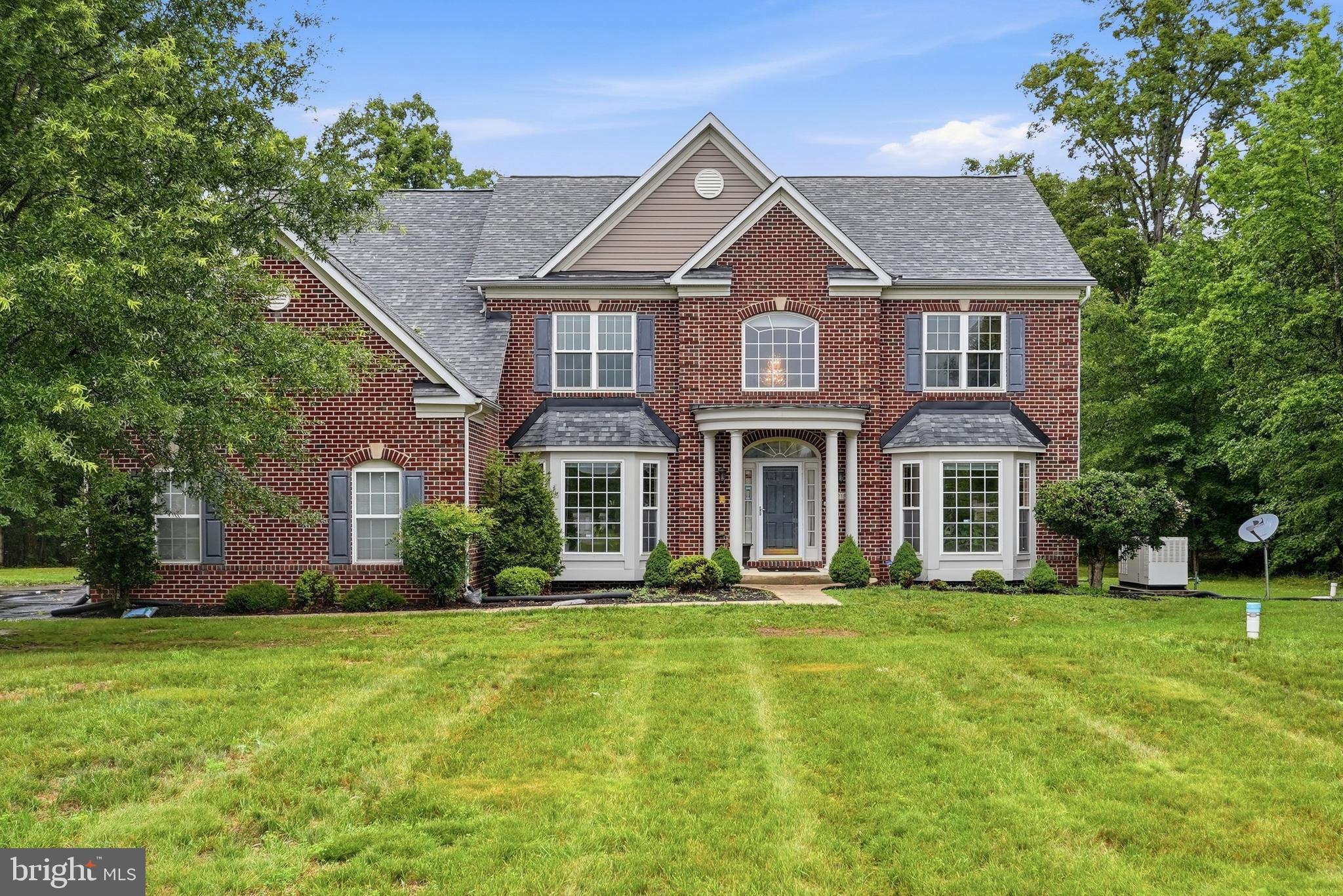 Home is more than where you live. It's where life happens. A place where everyone has room to spread out, where family gathers in the kitchen, mornings begin in the morning room, and evenings end in the comfort of your own private retreat. Set on 2.29 acres in Canterbury Estates, this impressive brick front home offers nearly 6,000 square feet with five bedrooms and four and a half baths. It's a home designed for the moments that matter most, from everyday routines to life's biggest celebrations.

Designed for both everyday living and entertaining, the main level features formal living and dining rooms, a private home office, a spacious family room, and a kitchen with a center island that opens to the morning room, creating a natural gathering place for family and friends. A first floor laundry room adds everyday convenience.

Upstairs, the primary suite offers a peaceful escape with a sunken sitting area, two walk in closets, and a private bath with a soaking tub and separate shower. Three additional bedrooms complete the upper level, including a Jack and Jill bath shared by two bedrooms and an additional full bath, providing comfort and privacy for family or guests.

The mostly finished lower level expands the possibilities with a fifth bedroom, a full bath, and abundant unfinished space ready for a recreation room, home gym, media room, or additional living space.

Outside, enjoy the privacy and freedom of a 2.29 acre homesite while remaining part of an established community with an HOA that maintains the common areas and provides snow removal. A three car garage, whole house generator, 500 gallon propane tank, well and septic system, plus recent improvements including a new roof in 2021, new windows on second level, a resealed driveway, and the septic system pumped in 2025 provide added peace of mind.

If you've been searching for a home that offers room to grow, space to entertain, and the privacy to truly enjoy where you live, this Canterbury Estates house is ready to welcome you home.