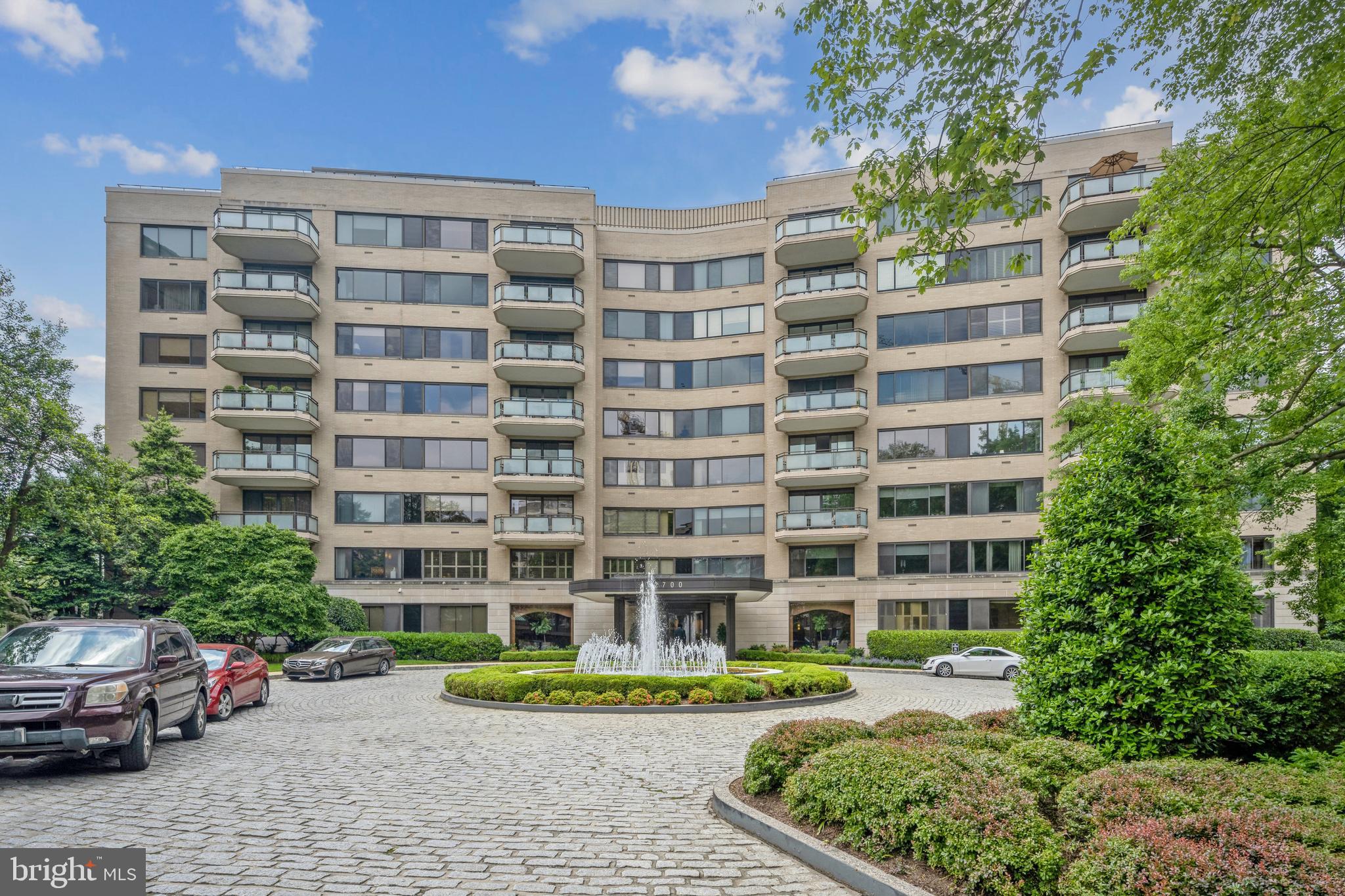 This exceptional Park Avenue-style residence at the prestigious Shoreham West is a truly rare offering, featuring 3,320 square feet of luxurious single-level interior living plus an extraordinary 2,540-square-foot private terrace and landscaped garden, bringing the total indoor-outdoor living space to 5,860 square feet. This unparalleled outdoor oasis, virtually unheard of in apartment living, provides a serene retreat and a spectacular setting for grand entertaining. Designed and renovated by former leading Washington, DC philanthropist Ann Loeb Bronfman, the home seamlessly blends classic elegance with modern functionality. Gracious formal rooms, oversized windows, and seamless access to the terrace flood the space with natural light and lush garden views, while a private locked gate from the terrace leads directly to 28th Street for unparalleled convenience. The primary suite is a private sanctuary featuring pocket doors, an office/sitting area, oversized windows, crown molding, and two walls of built-in bookshelves and a cabinet fitted for a TV, plus a dressing area that includes a cedar-lined walk-in closet and two additional reach-in closets. The spa-like primary bathroom boasts a soaking tub, separate glass shower with bench, Waterworks fixtures, and a high-end TOTO electronic heated toilet. The second bedroom suite includes a private office, two reach-in closets, and oversized picture windows overlooking the rear private garden. The third bedroom, currently a refined mahogany-paneled library, features floor-to-ceiling built-in bookshelves, recessed gallery lighting, a wet bar with a mirrored nook and copper sink, and direct access to the terrace, making it an ideal study or easily convertible back to a bedroom. A full hall bathroom serves the second and third bedrooms, featuring a green marble vanity, Waterworks fixtures, a sunken tub, a TOTO electronic heated toilet, and a marble-surround shower. In an octagonal interior space, there is a large closet with built in drawers and shelving. Additional highlights include a laundry room with an extra refrigerator, a large wine cooler, a utility sink, and ample cabinetry, as well as a beautifully appointed powder room with custom cloth wallpaper, beaded rope joints, copper faucets, and a stone-top vanity. The residence also features two cedar-lined coat closets, remote shades on all windows, heated bathroom floors and heated towel racks. Every detail of the home is curated with exquisite craftsmanship and timeless design. Owned by a local artist, the residence exudes creativity and character, offering a truly unique and inspiring living space. The full-service Shoreham West cooperative offers an array of premium amenities, including a rooftop lounge and multipurpose room with a catering kitchen, an expansive wrap-around rooftop with breathtaking views of the Washington Monument, and a state-of-the-art rooftop fitness center with bathrooms and changing rooms. Residents also enjoy access to a dedicated artists' studio, a private wine storage room, a doorman, a 24-hour concierge, and a manned garage entrance. The secure garage includes a manual car washing station, a pet washing/shower station, and the ability for owners to install personal EV chargers at their parking spaces. Ideally located, Shoreham West is just moments from Metro, and cultural landmarks such as the Kennedy Center, the National Zoo, and Rock Creek Park, with a variety of dining options along Connecticut Avenue. Recognized for its architectural significance, Shoreham West is featured in James M. Goode’s acclaimed book Washington Best Addresses. The monthly co-op fee of $7,883.86 covers two parking spaces, a two-level storage unit, all utilities, and property taxes, offering exceptional value in this prestigious full-service building. A must-see!