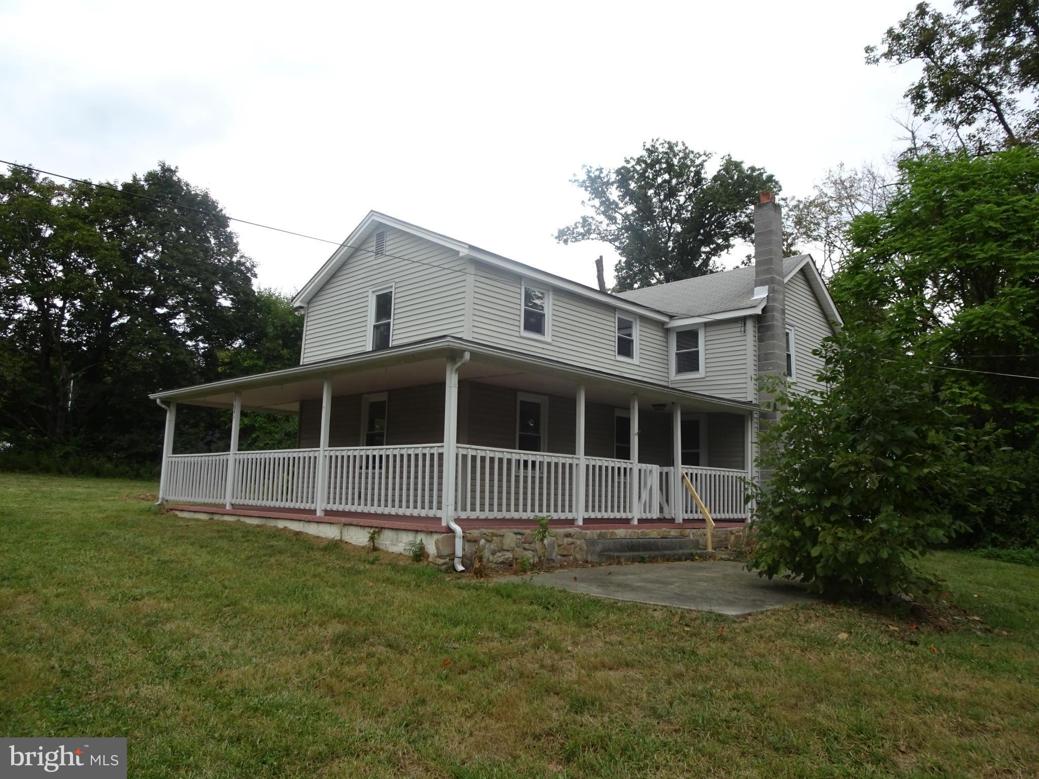 Detached colonial/farmhouse style with huge front and back yards. Will require TLC.  Secluded area, yet close enough to schools, restaurants, shopping, etc. to feel close to others.