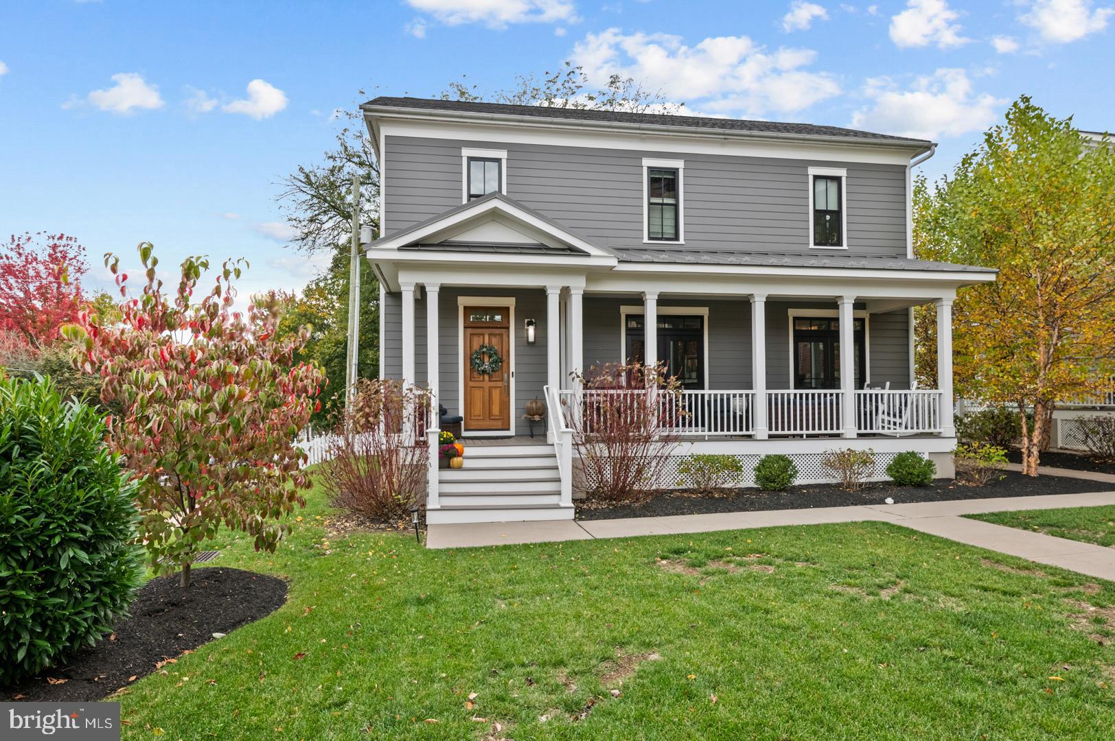Luxury walkable modern living in Wyomissing – Steps to West Reading, EV-ready, maintenance-free lifestyle.  Discover this truly unique 3-story single home offering over 2,930 sq. ft. of beautifully designed living space. Built just five years ago for the community’s original builder, this home blends luxury, functionality, and convenience — including a private elevator serving all levels. The main floor welcomes you with soaring 10-foot ceilings, bullnose corners, wood beams, and elegant engineered plank flooring. The kitchen is a showstopper, featuring a large center island, ceiling-height cabinetry, gas cooktop, wine nook with wine refrigerator, and abundant storage. Enjoy open, versatile living spaces with a sitting area/dining area, motorized shades with custom curtains throughout. A mudroom with the 1/2 bath and additional pantry storage and tile flooring offers access to the rear shared gas grill area. The home also boasts covered front and side porches, perfect for relaxing outdoors. The second floor features the primary suite, complete with his and hers walk-in closets, motorized shades, and a spa-like bath with an oversized walk-in shower, double vanities, and private water closet. A spacious second bedroom includes a  full ensuite bath, walk-in closet, and custom window treatments. A convenient laundry room (washer and dryer included) completes this level. The finished lower level adds 870 sq. ft. of living space, offering a large family/TV room with built-in shelving and an electric fireplace, the third bedroom with full bath and a generous storage room — it makes an ideal guest suite or in-law setup. Additional Highlights include a Private elevator accessing all three floors, a whole house sound system, Dedicated canopy parking space under a large canopy with a level 2 electronic car charger access, a gym in the main building, two common area fire pits and an Association for low-maintenance living all within a small community with a Prime Wyomissing location that’s within walking distance to shopping, dining, and amenities. This extraordinary Wyomissing residence combines contemporary luxury with thoughtful design and unbeatable convenience — truly a must-see home for the discerning buyer.