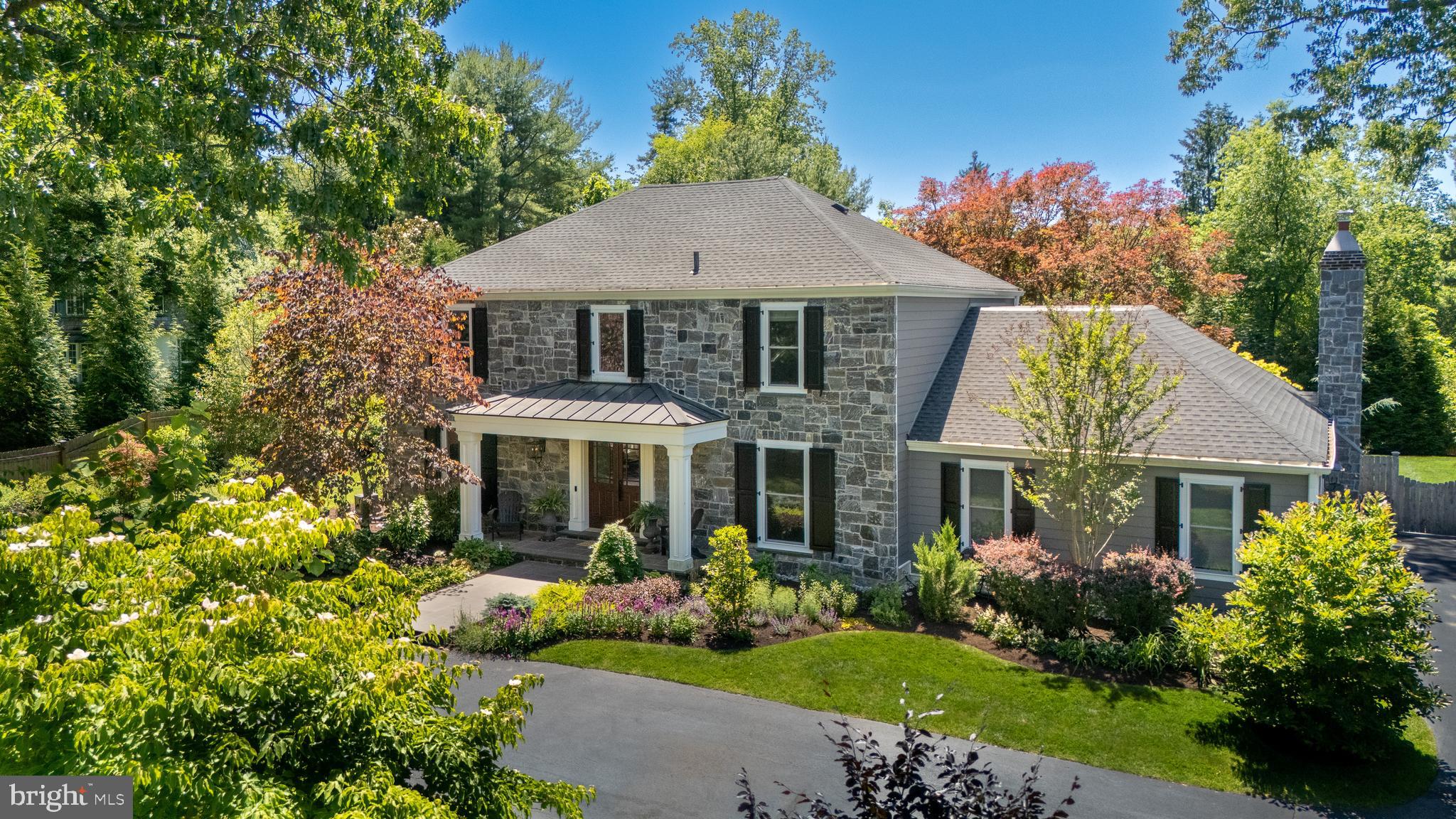Nestled in one of Radnor Township’s most sought-after double cul-de-sac neighborhoods, this beautifully updated home offers move-in-ready convenience, exceptional privacy, and a warm close-knit community feel. Extensive exterior improvements — including a new roof, stone façade, HardiePlank siding, and welcoming front porch — combine with the home’s gracious circular driveway to create outstanding curb appeal. Professionally redesigned landscaping, dozens of specimen plantings, a fully-fenced yard, and spacious rear deck transform the property into a private outdoor retreat perfect for entertaining, relaxing, and enjoying every season. Inside, bright and inviting spaces are designed to bring the outdoors in, with abundant natural light, new deep-set windows throughout, and seamless flow among its well-proportioned rooms. The cheery kitchen and skylit breakfast room open to the family room and outdoor living areas, lending ease to sophisticated everyday living. Thoughtful updates throughout include upgraded mechanical and electrical systems, whole-house generator, renovated laundry, refinished hardwood floors, fresh paint, custom window treatments, and new recessed lighting in every room, creating a comfortable, cheery, and truly turnkey home. Located in the award-winning Radnor School District and assigned to the particularly well-regarded Ithan Elementary School, this special home is just minutes from Wayne, Bryn Mawr, Ardmore, Newtown Square, Devon, Paoli, and the many parks, trails, shopping, dining, and major commuting routes that Main Line living offers. A turnkey opportunity awaits the next lucky buyer!