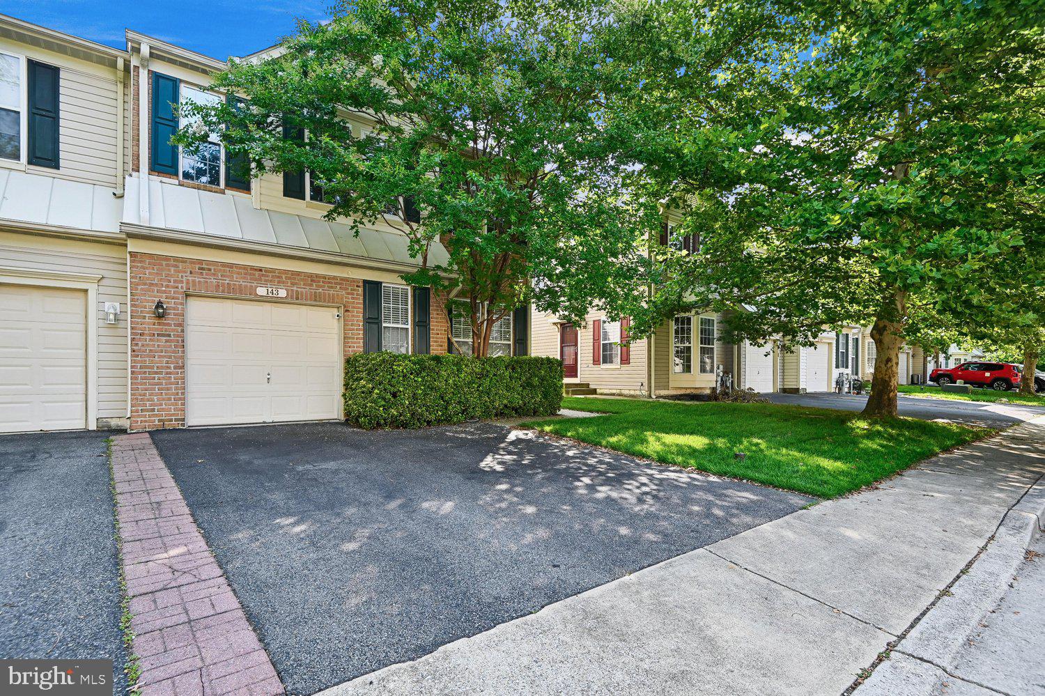 Welcome home to this beautifully maintained end-of-group three level townhome offering spacious living and an abundance of natural light. The open floor plan features impressive 9 ft ceilings, creating a bright & airy feel throughout.  The home offers 3 generously sized bedrooms, 2.5 baths, a versatile lower level recreation room with cozy gas fireplace, perfect for relaxing or entertaining.  Enjoy living in the amenity-rich community featuring 2 pools, fitness center, playground, tennis courts & scenic walking paths.  Conveniently located near shopping, dining & close commuter routes.  Don't miss this wonderful opportunity!
