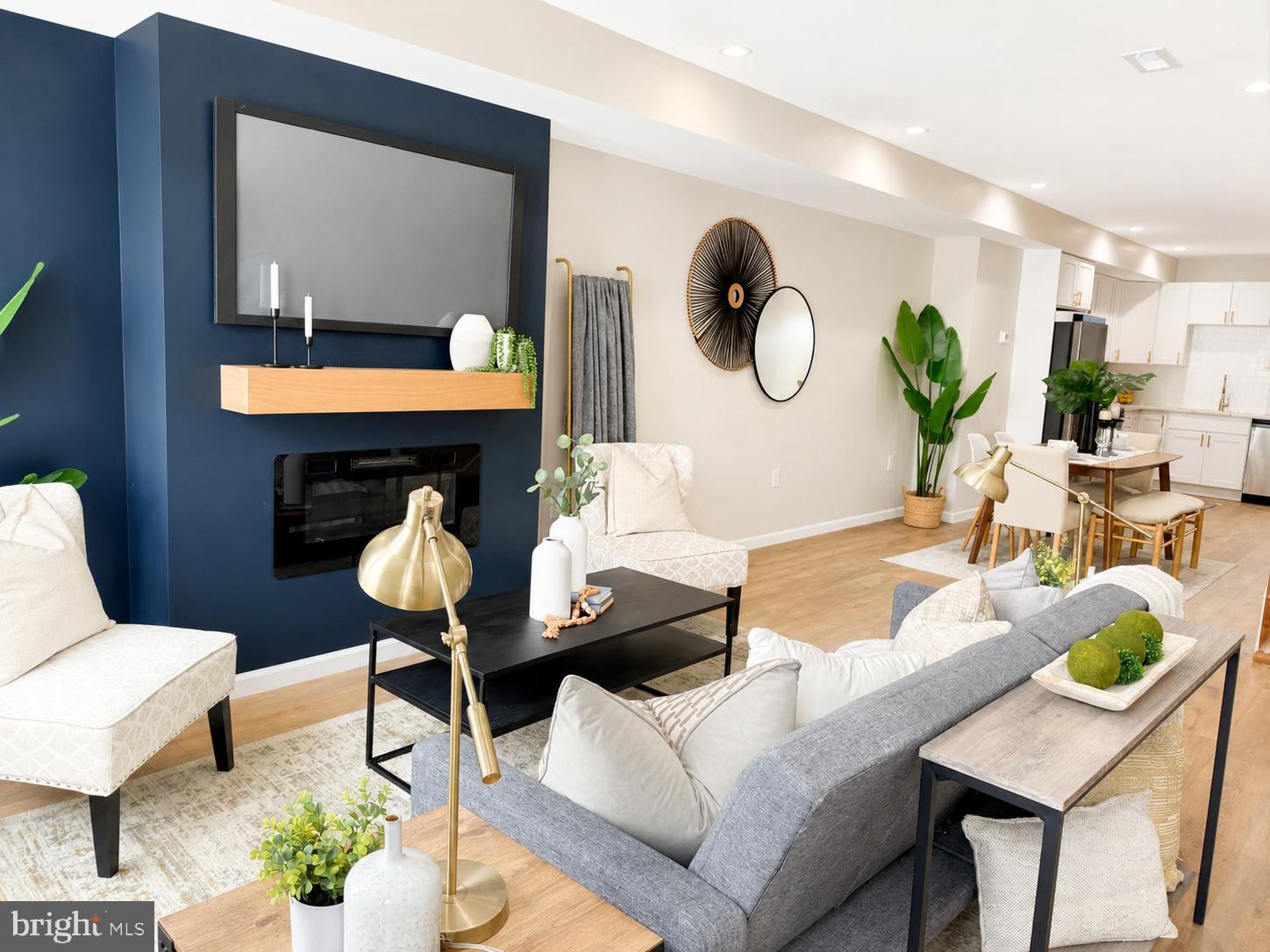 Welcome to this stunning, newly renovated townhouse offering over 1,500 square feet
of beautifully finished living space in one of Baltimore City’s most exciting and rapidly
revitalizing neighborhoods, just minutes from Johns Hopkins Hospital. This spacious
four-bedroom, three-and-a-half-bath home seamlessly blends modern finishes with
functional design and exceptional city convenience. Step inside to an inviting open-
concept main level, perfect for entertaining and everyday living. The sun-filled living and
dining areas flow effortlessly into a gourmet kitchen featuring sleek quartz countertops,
premium cabinetry, stainless steel appliances, and ample workspace for the home chef.
Just beyond the kitchen, you’ll find a convenient half bath, perfect for guests, along with
direct access to the rear deck—an ideal space for relaxing, grilling, or enjoying your
morning coffee. The upper level features a spacious primary suite complete with its own
private en-suite bathroom, creating a comfortable retreat. A generously sized second
bedroom is served by a well-appointed full bathroom located in the hallway, providing
convenience for both residents and guests. The fully finished lower level adds incredible
versatility, featuring a full bathroom, laundry area, two additional rooms, and a separate
entrance—ideal for an in-law suite, guest quarters, home office, or potential rental
opportunity (buyer to verify permitted uses).Outside, enjoy the convenience of a private
parking pad, along with plentiful street parking. Ideally located near Johns Hopkins
Hospital and surrounded by ongoing neighborhood revitalization, you’ll be just moments
from Eager Park, Starbucks, neighborhood cafés, restaurants, and community green
spaces. The Inner Harbor, Fells Point, and downtown Baltimore are all just minutes
away, offering easy access to some of the city’s best dining, entertainment, and cultural
attractions. Don’t miss this opportunity to own a beautifully renovated home in one of
Baltimore City’s fastest-growing neighborhoods.