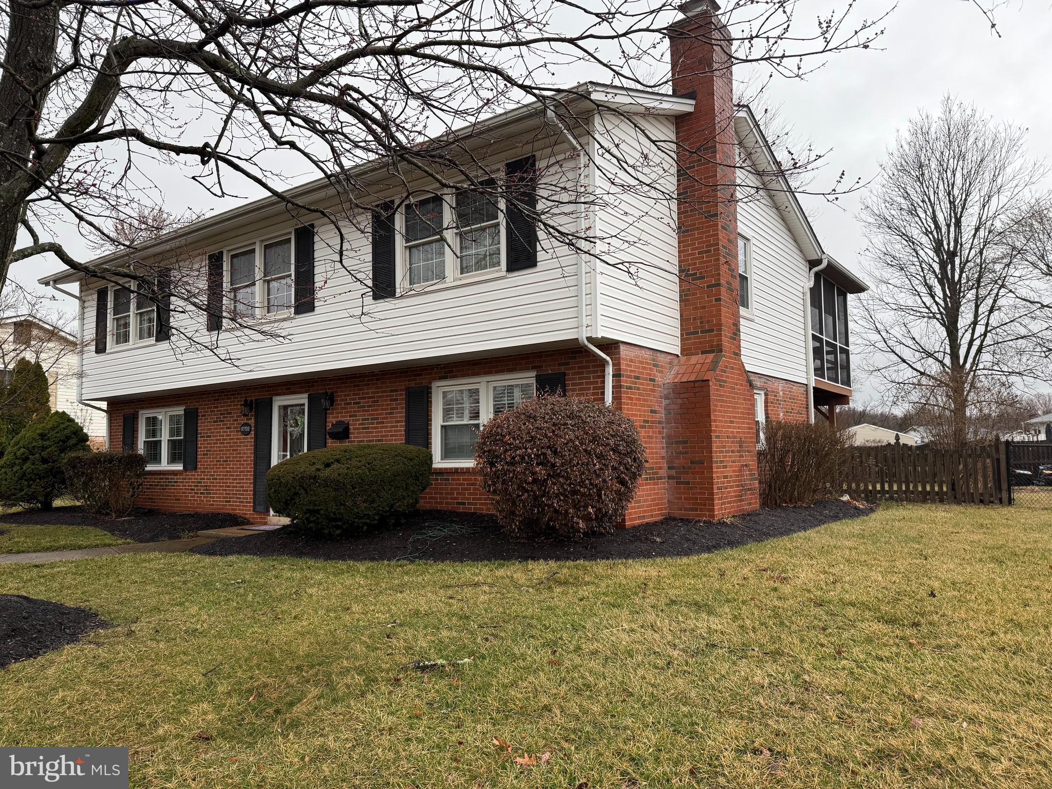 Welcome home to this lovingly maintained & charming 4 bedroom, 3 bathroom home in the heart of Manassas! Thoughtfully designed with versatile living spaces, this home offers a main level bedroom full bath, and a cozy second living room with a gas fireplace, perfect for guests or an in-law suite.  There's also a large storage area with a utility sink for added convenience.

Upstairs, you'll walk into the main living area which has beautiful hardwood floors throughout!  The living room flows into the dining room and eat-in kitchen.  The dining area also connects out to the fully screened-in porch above the deck, which is perfect for enjoying your morning coffee or the evening breeze!   The kitchen cabinets are CraftMark cabinets, and there are beautiful plantation shutters on the majority of the windows throughout the home.  

When you step outside you'll find a large, fenced-in backyard, complete with a flagstone patio for outdoor gatherings and a detached storage shed for all your tools and equipment.  Conveniently located near shopping, dining, commuter routes, and just around the corner from Sudley Elementary School, this home is ready for you to make it your own!  Don't miss this incredible opportunity! Schedule your showing today!

Updates:  Roof was replaced in 2019, outside condenser unit and inside coil unit were both replaced in 2017,  and the water heater was replaced in 2019.  The windows are double paned and newer, as well (unsure of age).