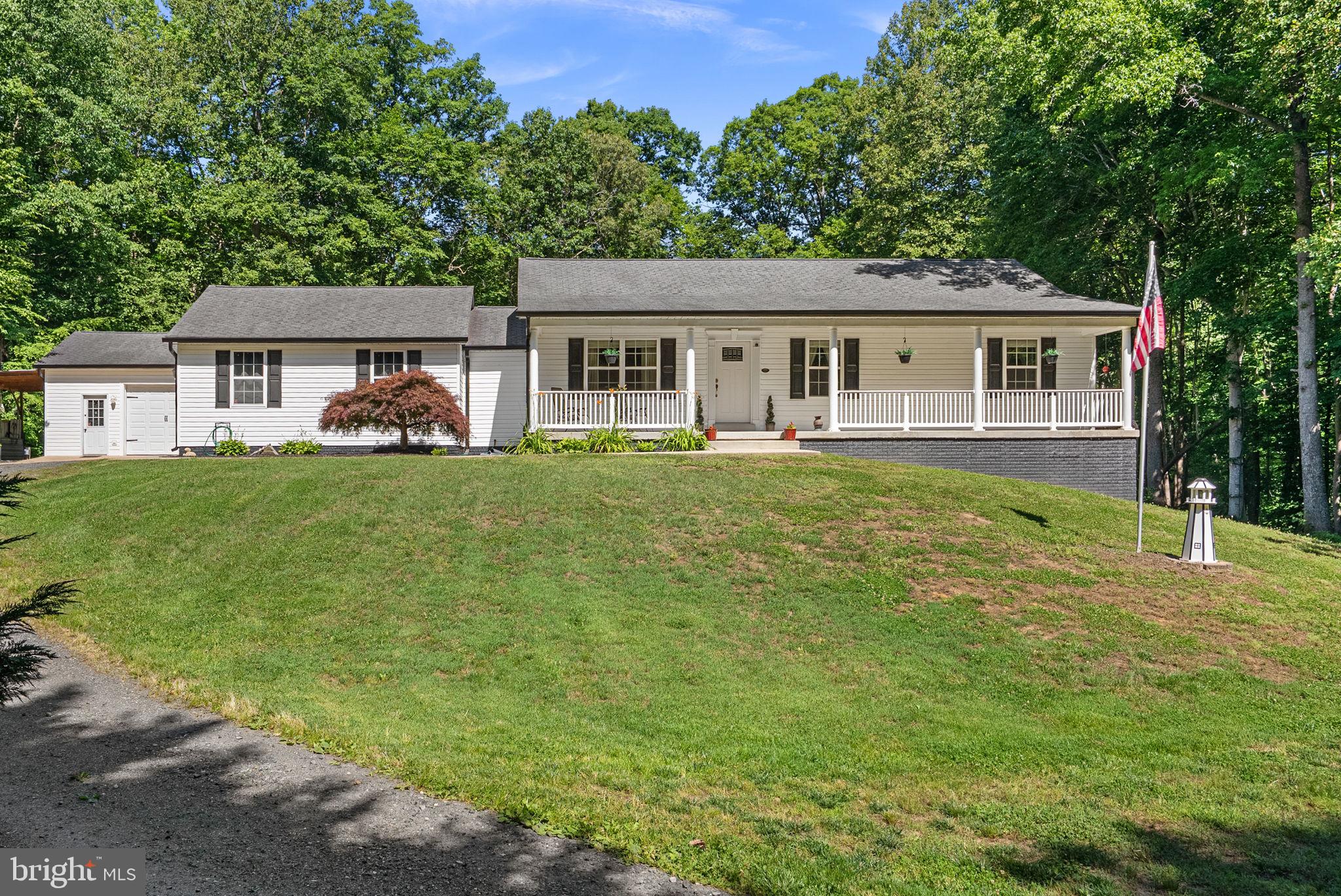 Step into seclusion! Rambler with full finished basement on over 3 acres and NO HOA!
Large deck and fully fenced yard complete with your own chicken coop perfect for the budding farmer.  New stainless steel appliances.  Completely move in ready.  Private drive and
surrounded by mature trees.