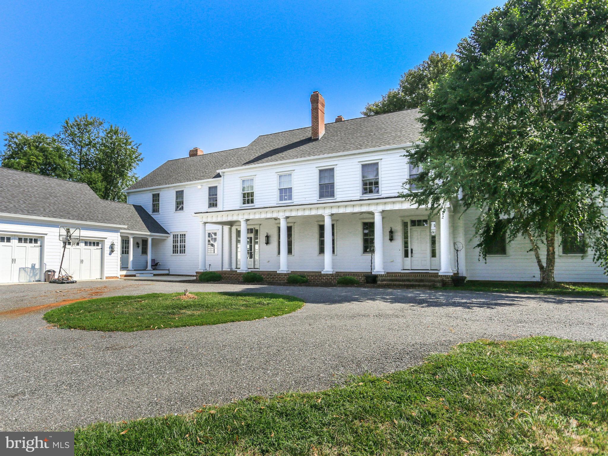 Unbelievable renovated Farm house in 2008. Homeowner spared no expense. Kept the charm of this wonderful 1850 home. New windows, Hardwood floors on main and Up, Beautiful oversized mouldings, 7 fireplaces, 7 1/2 Baths, Kept some original flooring, doors and hardware, Gourmet kitchen, upstairs laundry, Huge floored attic with bath rough-in, Separate In-law Au Pair Suite.You must see this one!!!!!!