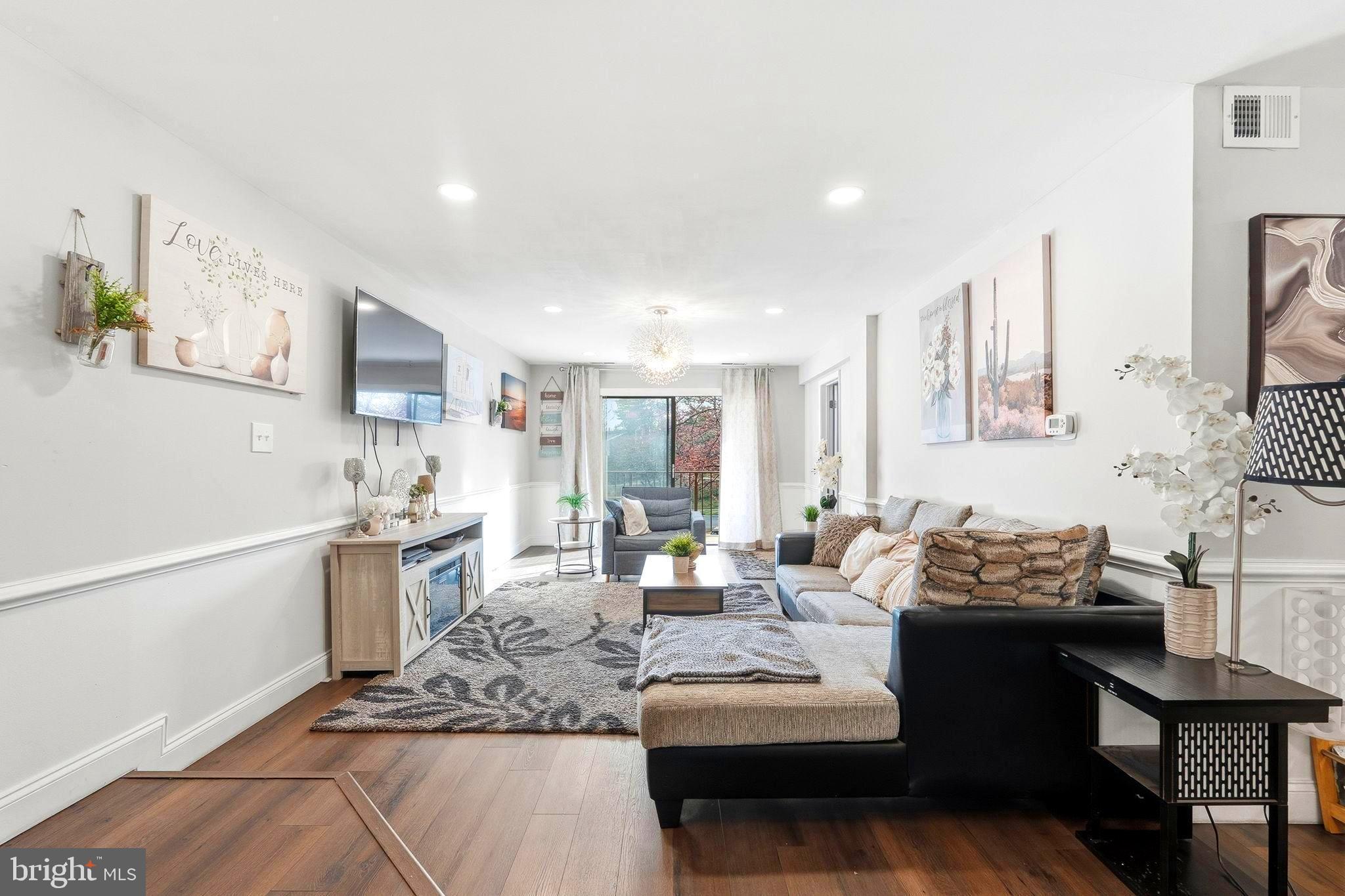 Welcome home to this stunningly refreshed 2-bedroom condo, where every detail has been thoughtfully curated for contemporary living. With no lease delays, this property is completely vacant and ready for its new owner! Step inside to an inviting, open-concept living and dining layout glowing with natural light, featuring premium luxury vinyl plank flooring, designer recessed lighting, and a fresh, modern color palette.

The efficiently designed kitchen maximizes every inch, boasting crisp white cabinetry, sleek granite countertops, and premium stainless steel appliances. The luxury extends into the bathroom, beautifully upgraded with a brand-new vanity and chic lighting. Unwind in the spacious primary suite, complete with a massive walk-in closet that offers exceptional storage.

Bonus Features: Sip your morning coffee on your large, private balcony, and enjoy the ultimate convenience of an in-unit washer/dryer, dedicated parking, and a rare, private basement storage unit! The low-maintenance condo fee offers incredible value—covering water, trash, lawn care, snow removal, and access to the sparkling community pool. You only pay electric! Turn-key living at its absolute finest.

Ideally located minutes from Wegmans, Germantown Town Center, and Topgolf, with lightning-fast access to I-270 and the MARC train for an easy commute to Bethesda or D.C. Outdoor enthusiasts will love being just a short drive from Black Hill Regional Park. Don’t miss this opportunity—schedule your tour today!