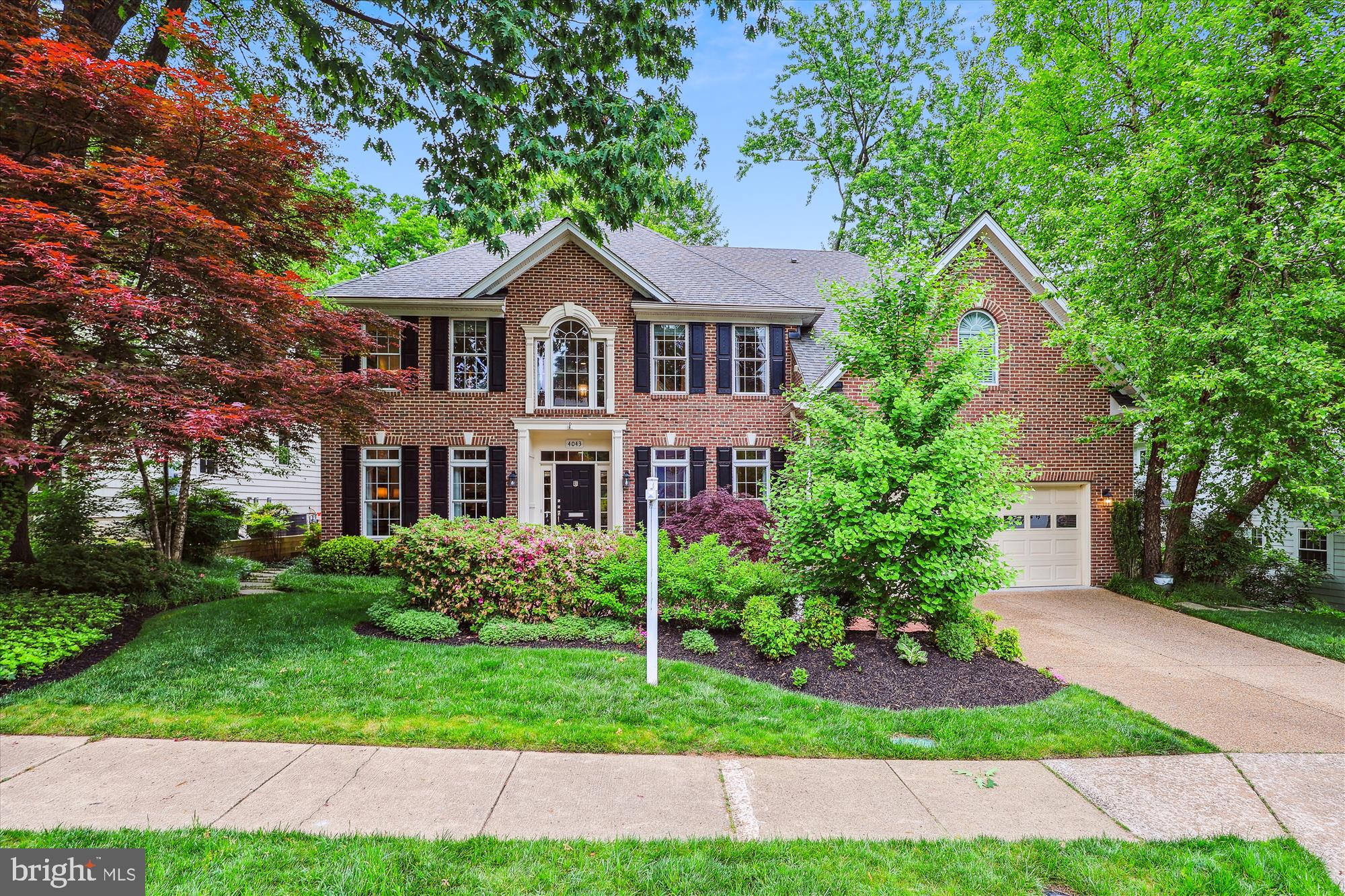 As you enter this Impeccable, gracious home  a soaring 2 story foyer and a grand staircase greet you. ( A second staircase leads to the upper level from the kitchen). To the right is a formal dining room for family and holiday gatherings   A formal  living room is  to your left and is drenched in  sunlight from the large windows which are  featured throughout the home. Cathedral ceilings await you in the family/great room with fireplace. The  floor to ceiling windows overlooking the lush private rear yard make this a relaxing and serene place to gather. This main level incorporates a home office with a view of the treed rear yard. There is a half bath on this level as well. A renovation of the kitchen was completed in 2019  with custom cabinets, sub zero refrigerator, marble backsplash and a large pantry closet. There is a delightful adjoining breakfast area and a door leading to the  deck and large patio area for all your private entertaining needs. From the kitchen area you access the oversized 2 car garage and the first floor laundry room. The garage is freshly painted and epoxy flooring just completed. The garage  features a built in/mud room area. The homes' upper level is stunning with a primary bedroom & bath  renovation completed in 2023. The primary suite offers a tranquil oasis with a sitting area, tray ceilings,  a large bathroom with double sinks, quartz counter tops  & a separate vanity area, a, large free standing soaking tub, a walk in shower  and a fabulous dream sized  walk in closet complete with  built ins. From the cozy sitting area there is a balcony with a view of  the lush and private backyard. This primary suite  has seamless continuity with hardwood floors throughout. Additionally there are 3 other generously sized bedrooms 1 with a full bath and  2 other  bedrooms  joined by a jack  and  jill bathroom with double sinks. Both bedrooms have walk in closets. The exceptionally large lower level featuring 1694 sq feet has new LVP (2024)  a large bar area for entertaining plus a pool table that conveys and a bonus room, with closet, perfect for guest or au pair.  A full bath is also on the lower level, plus multiple storage areas. This homes boasts a  large 12,000+ sq ft lot with extensive hardscape, fully fenced and private.  Dual staircases, Hardwoods on Main level and Primary suite.  This is truly a forever home!