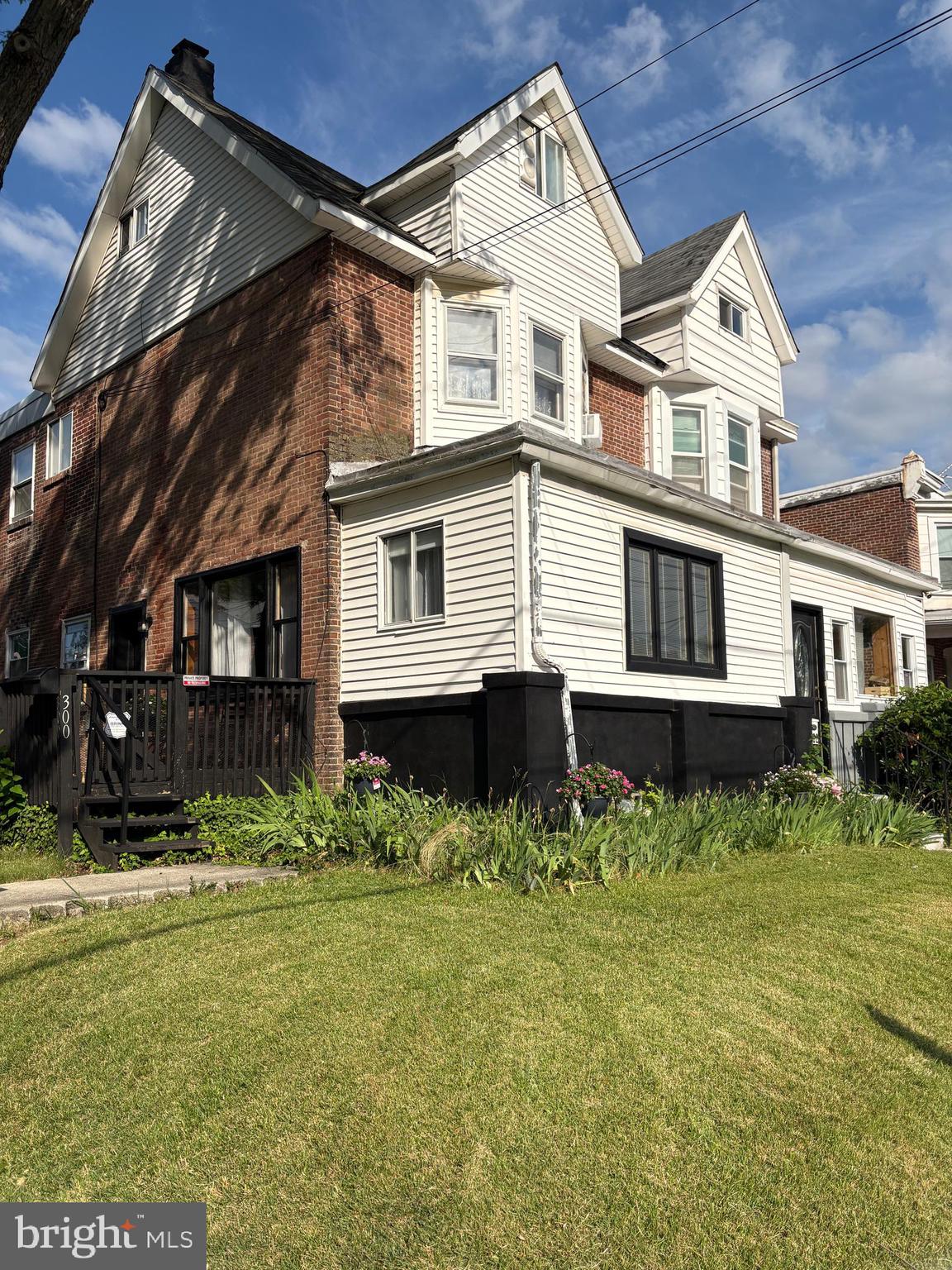 A lovely corner property with flow and an organized use of space both inside and out.  300 Clifton Avenue offers 3 bedrooms, 1 and a 1/2 baths, plus a bonus room and powder room on the first floor as well as a main floor laundry.  All of that in addition to a "clean" unfinished basement, front deck, covered back deck, fully fenced yards and off-street parking for 2 cars make this property hard to beat. Laminate flooring, floating stairs and modern decor make 300  Clifton feel like a private oasis.  Large bedrooms and a full bath with tub/shower combination offer comfort and convenience for the homeowner.  The back and side yards are spacious enough to enjoy playtime and entertaining for both pets and people.  The privacy fence and covered back deck invite  relaxation and outdoor time in a tranquil space.  This home has been well-maintained and occupied by the same owner for the last 46 years.  Now is your chance to make this peaceful and beautiful space your own.
