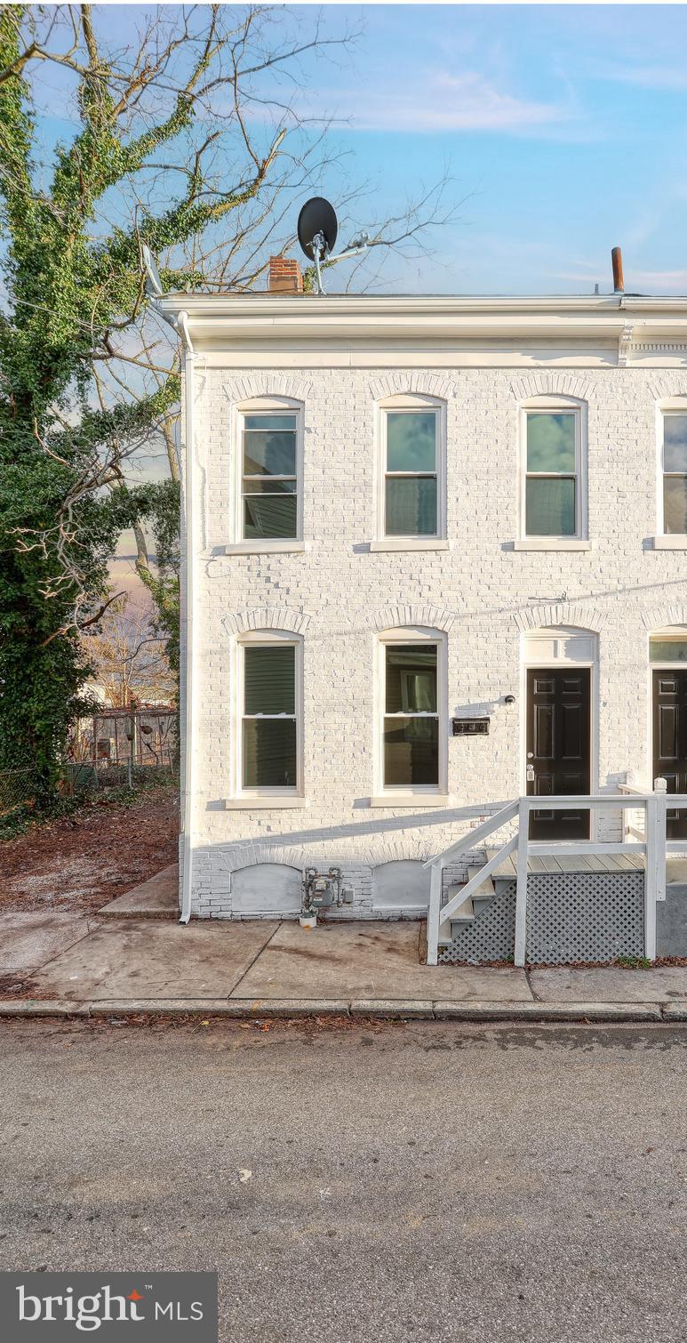 Semi-detached, affordable home ready for a new investor or a homeowner. This home has new windows, flooring and paint. The rubber roof on back of home was recently replaced. Convenient off-street parking large enough for 2 vehicles. This home is priced well so act fast : )