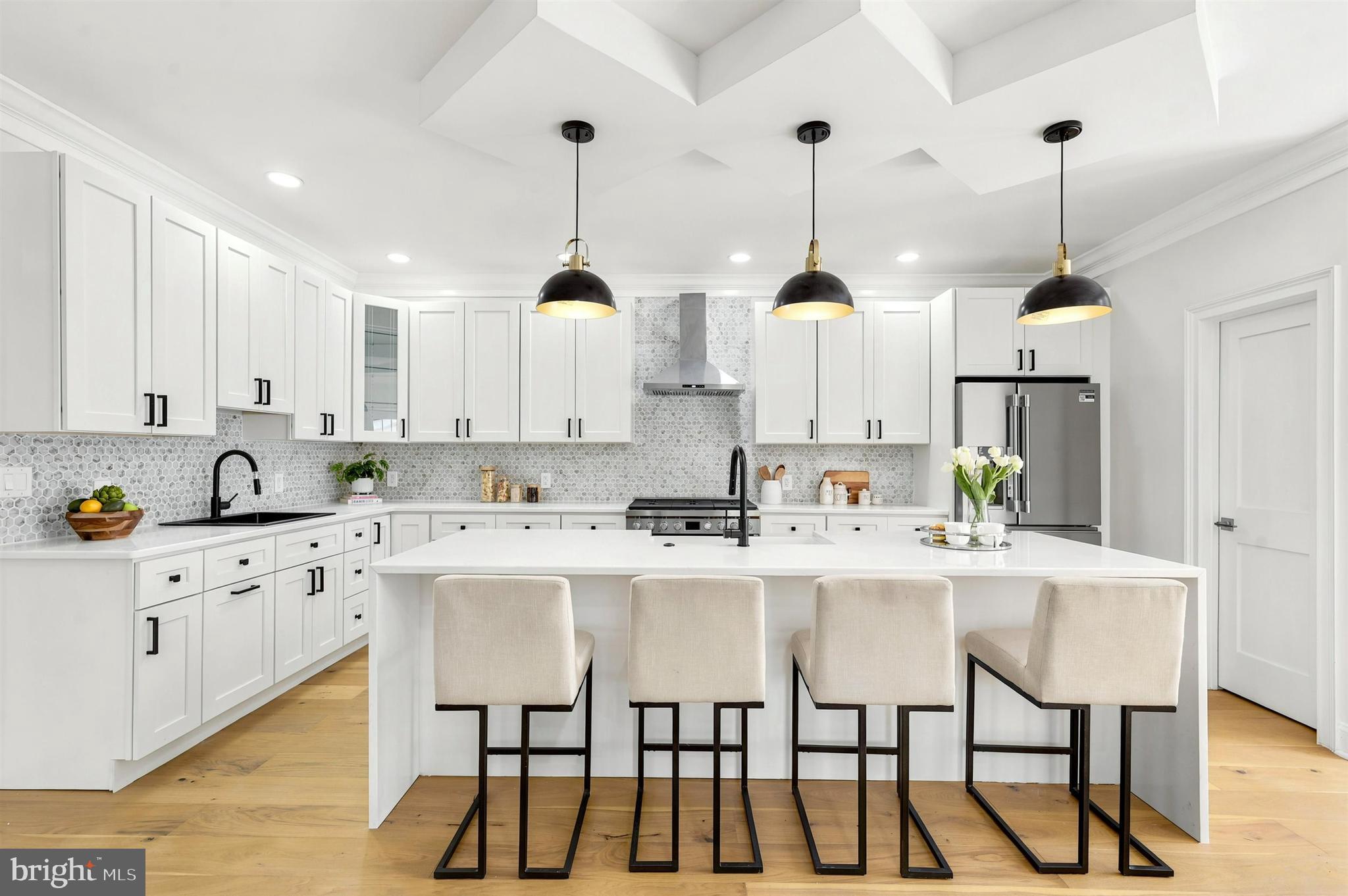 Exquisite New Construction Home with Luxury Finishes – 

Welcome to a stunning masterpiece of modern craftsmanship and timeless elegance. This 5-bedroom, 4.5-bathroom luxury residence, spanning 3,500 finished sq. ft., is designed to impress with impeccable details, high-end finishes, and thoughtfully curated spaces that redefine sophisticated living.

Unrivaled Elegance & Craftsmanship
Step inside to discover an open-concept design adorned with coffered ceilings, layered lighting, and engineered oak hardwood flooring throughout the main and second levels. The spacious living area is anchored by a gas fireplace, setting the tone for cozy yet refined gatherings.

Chef’s Dream Kitchen
The heart of this home is a gourmet kitchen, meticulously designed for both function and style. Featuring 42-inch custom soft-close cabinetry, quartz countertops, and a grand 9-foot island, this space is a culinary haven. The farmhouse sink, prep sink, and stainless steel appliances complete the chef-inspired layout, while a walk-in pantry ensures ample storage.

Luxurious Primary Suite & Spa-Inspired Bath
Retreat to the expansive primary suite, where comfort meets luxury. The en-suite bathroom is a sanctuary with a dual-head shower, his-and-hers sinks, quartz countertops, and a private water closet. A generous walk-in closet adds to the suite’s lavish appeal.

Exceptional Layout & Features
Five spacious bedrooms with plush carpeting (excluding the master suite)
Four full baths & one powder room, all with luxury tubs and showers
A third-floor loft & balcony, offering a private escape with breathtaking views
Main-floor laundry room for ultimate convenience
Smart home technology & energy-efficient HVAC systems (dual-zone)
Gas cooking & heating (lower level), electric HVAC (upper level)
Impressive Exterior & Outdoor Living
Set on 0.7 acres, this home offers an unparalleled outdoor experience. Enjoy morning coffee on the covered front porch with ceiling fans, or entertain guests on the composite deck with elegant French doors leading from the main living space. A detached two-car garage features a stylish mix of stone and siding, while a rear easement entrance ensures privacy and convenience.

Prime Location & Community Perks
Located in the sought-after Wallingford-Swarthmore School District (Strath Haven High School), this home provides easy access to major highways, public transportation, parks, shopping, and fine dining. Enjoy the best of suburban tranquility while being moments away from city conveniences.

Endless Customization & Upgrade Options
Buyers have the opportunity to personalize their dream home with custom finishes, optional upgrades, and tailored design features to suit their lifestyle. From heated floors to built-in storage solutions, the possibilities are endless.

This is more than a home—it’s a statement of luxury, comfort, and impeccable design. Secure your place in this exclusive opportunity today!