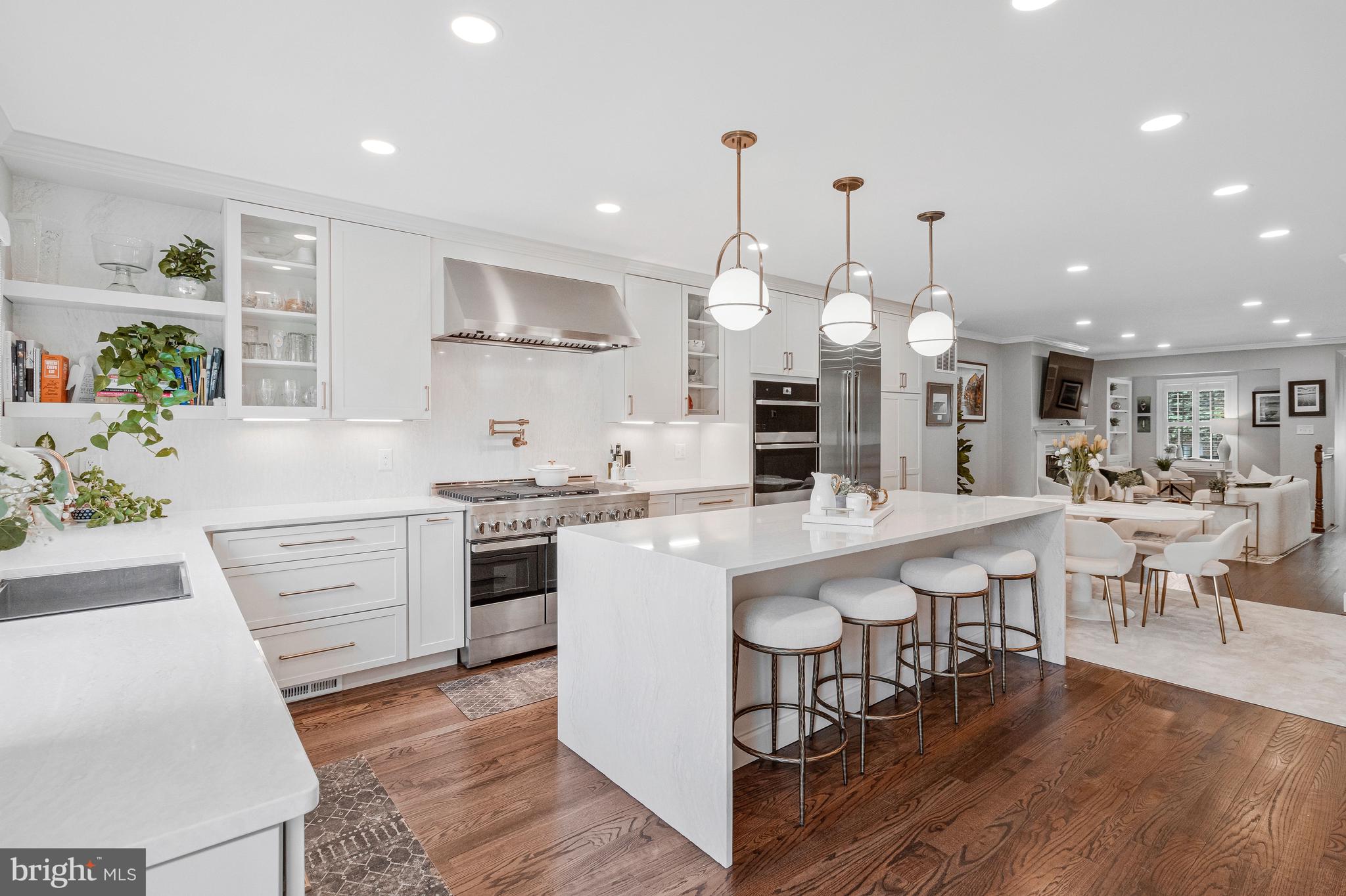 Experience a lifestyle of uncompromising quality in this nearly 2,500 square foot 3 bedroom, 3.5 bath sanctuary, meticulously reimagined in 2025 with a three-story addition and full renovation to evoke the sophisticated atmosphere of a five-star boutique hotel. This rare Old Town find seamlessly blends high-end materials with an effortless flow designed for the modern entertainer, centered around a true professional chef’s kitchen. This culinary epicenter is outfitted with premium cabinetry, a bespoke marble backsplash, industrial-grade stainless steel appliances, and a convenient pot filler. The expansive waterfall-edge island serves as the home’s social hub, overlooking a light-drenched "Great Room" where guests can transition from the sleek fireplace to al fresco dining on the private back deck with ease.
The luxury continues upstairs in the primary retreat, a private wing featuring a spa-inspired ensuite that rivals the world’s finest resorts with its massive deep-soaking tub, walk-in shower, and custom-integrated storage. A spacious second bedroom and full bathroom round out the upper level. The thoughtfully designed lower level provides a secondary sanctuary with a bedroom, full bathroom, and another center room perfect for a guest suite, home gym, or office, followed by an additional living room leading directly to a lushly landscaped backyard oasis that offers total serenity.
Located in a premier location near the Old Town waterfront, DCA, and DC, this turnkey masterpiece is a rare opportunity for the discerning buyer who demands top-of-the-line finishes in a walkable, world-class community.