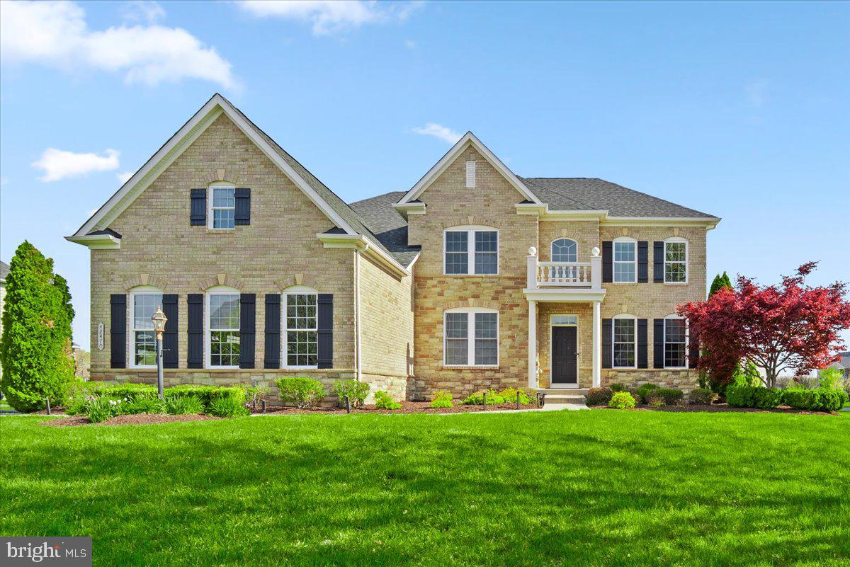 Luxury Pool Home in Dawsons Corner | 5,400+ SF | Gourmet Kitchen | Walk-Up Basement | Chantilly VA
Step through the front door and into a home that has been transformed at every level — from the resort-caliber mineral pool and outdoor kitchen to the two-story family room with coffered ceilings and floor-to-ceiling stone fireplace surround. This is not a spec home with builder-grade finishes. This is a property where every upgrade was chosen with intention, and it shows.

The Pool & Outdoor Living
The fenced backyard centers on a custom mineral pool with natural stone wall and cascading fountain — a private retreat designed for year-round entertaining. The covered porch features Trex composite flooring, a wood-plank ceiling, and retractable screens, creating a true four-season outdoor room. Add the built-in outdoor kitchen, gas fire pit, professional landscaping, and integrated outdoor speakers, and you have an entertainment package that rivals homes at twice this price point.

The Kitchen & Main Level
The gourmet kitchen is built around an oversized center island with quartz countertops and backsplash, premium stainless steel appliances, a four-burner cooktop, and a butler's pantry. A bright breakfast area overlooks the soaring two-story family room. Gleaming hardwood floors run throughout the main level, connecting the formal living and dining rooms, a private home office with built-in shelves and bay window, and an upgraded mudroom. Dual staircases with custom metal spindles create a striking architectural statement.

Primary Suite & Upper Level
The owner's suite features a tray ceiling, two spacious walk-in closets, and a spa-caliber bath with soaking tub, frameless glass shower, and dual vanities. Three additional bedrooms offer generous proportions — two connected by a Jack-and-Jill bath, the third with its own private full bath. Four-and-a-half baths total.

Finished Walk-Up Basement
The lower level walks up to grade and includes a large recreation room with custom stone accent walls, a wet bar with new flooring, a full bathroom, and substantial unfinished space ready for a home theater, fifth bedroom, or gym.

Smart Home Ready
Programmable thermostats, LED lighting systems, integrated outdoor lighting, and built-in outdoor speakers — all designed for connected modern living.

Dawsons Corner Community
HOA amenities include two swimming pools, a clubhouse with fitness center, tennis courts, soccer field, and an outdoor park — a true resort-caliber neighborhood for families and professionals.

Location
Minutes to Dulles International Airport, One Loudoun, Reston Town Center, and Tysons Corner. Direct access to Route 50, Route 29, and I-66. Top-rated Loudoun County public schools. Washington DC within easy reach.
4 BR | 4.5 BA | 4,493 SF Above Grade | 5,400+ SF Total | 0.35-Acre Fenced Lot | 3-Car Garage | Mineral Pool | Outdoor Kitchen | Gas Fire Pit | Screened Porch | Walk-Up Finished Basement | Wet Bar | Smart Home | Hardwood Floors | Coffered Ceilings | Dual Staircases | Chantilly VA 20152