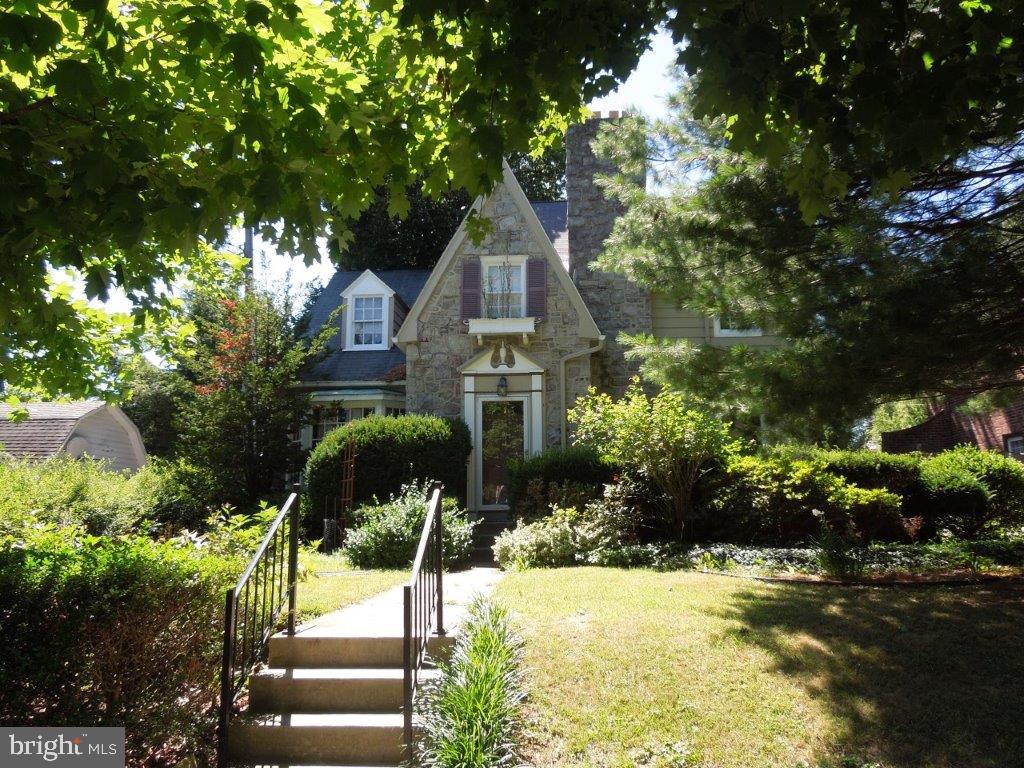 Location, location ,location! Charming 3 bdrm 2.5 bath home conveniently located in picturesque Elmwood neighborhood. Needs some of your TLC to bring it back to its full glory.  Fall in love with the possibilities and potential this quaint fairytale house has to offer. All the character and charm of yesteryear with arched doorways, deep window sills, hardwood floors, lovely brick gas fireplace and adorable library/den with built in book shelves.  2 patios and a deck males for perfect outdoor entertaining.Nestled on a corner lot with lush beautiful mature landscaping. Lovely patios in the front and back of the house. Bring your hot tub and enjoy a very private and tranquil fenced in yard.   Make this this solid classic home with loads of charm yours with your personal touches . Price to sell as is.
