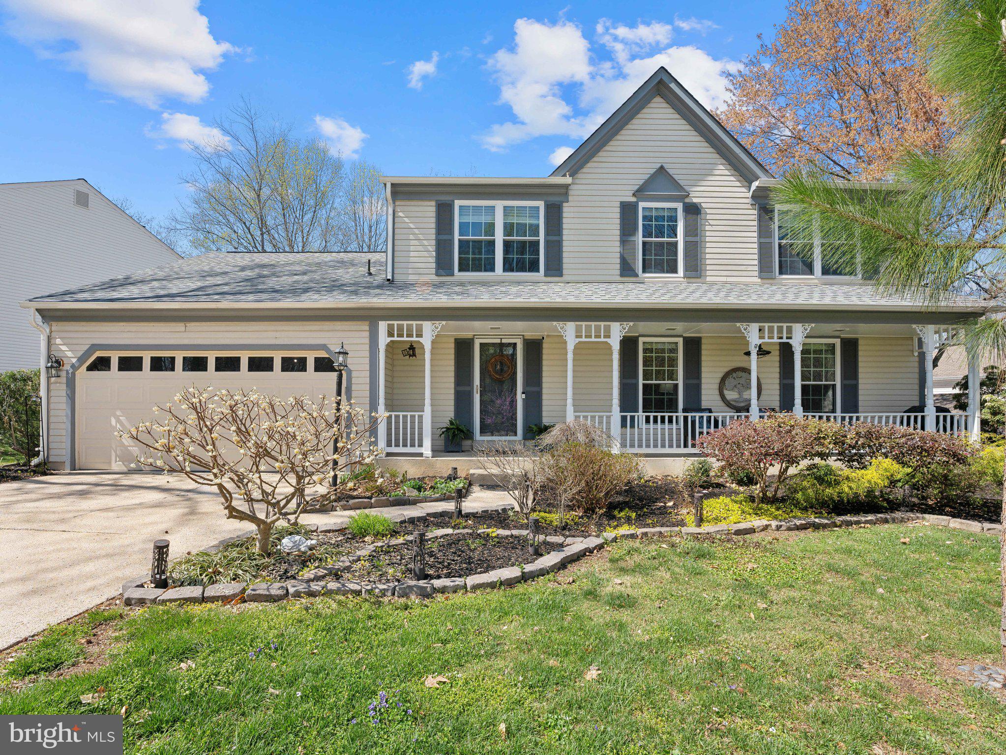 Gorgeous 4 bed, 2.5 bath single family home on a quiet cul-de-sac in Lake Ridge. Covered front porch and fully fenced-in rear yard with walk-down deck. 2-car garage with additional storage/workshop space. Kitchen was fully remodeled in 2016 with quartz countertops, stainless steel appliances, island with seating, new cabinetry, farmhouse sink, and pendant lights. Dining room off the kitchen with bay window. Main level hardwood floors replaced in 2016. Inviting foyer with iron railing on the staircase. Main level half bath, wood burning fireplace, and laundry/mud room off the garage. Four spacious bedrooms on the upper level. Primary bedroom has renovated bathroom, recessed lights and walk-in closet. Upper level hall bathroom remodeled in 2016. Unfinished basement has over 1,100 sq ft including a bathroom rough-in and rear walkout to the backyard. Updates include: HVAC 2019, water heater 2019, architectural shingle roof and gutter guard 2016, windows 2017, basement electrical panel 2018, sump pump 2016, rear fence 2016, thermostat 2019, deck stain 2025.