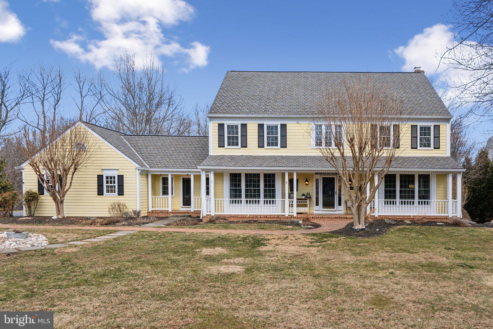 FALL IN LOVE WITH THIS PICTURE-PERFECT HOME nestled in the highly sought-after Haddonfield Community, set on 2 acres of stunning property. This exquisite residence boasts 5 bedrooms and 4.5 bathrooms, featuring a beautiful four-season sunroom with vaulted ceilings and custom wood beams, a charming front porch, a low-maintenance Brazilian hardwood deck, multiple patios, and an outdoor shower.

As you step into the foyer, you're greeted by the home's captivating charm, highlighted by gleaming hardwood floors and a two-story foyer, along with walls of windows that offer breathtaking views of the grounds. The upgraded gourmet kitchen is a chef’s dream, complete with a spacious center island, stone countertops, custom cabinetry, and a large breakfast room with a bay window that opens to the inviting family room, equipped with a wet bar, fireplace, and glass doors leading to the sunroom.

Host elegant dinner parties in the formal dining room or relax in the expansive living room. The main level study features custom built-ins and a separate exterior door that leads to the front porch. Conveniently located off the 3-car garage, you'll find a large mudroom with a brand-new front-loading washer and dryer.

On the upper level, the Owners' Suite offers two walk-in closets and a stunning spa-like bathroom for your ultimate relaxation. Three additional spacious bedrooms are upstairs, including one with a dual-entry bathroom and another with an en-suite bathroom and private deck. The walk-out lower level is perfect for entertainment, featuring two separate dens, a full wet bar, the home's fifth bedroom, a full bathroom, a gym area, and ample storage.

The meticulously landscaped outdoor grounds provide a tranquil, zen-like setting. With multiple decks, patios, and porches, this home is an entertainer's paradise, offering plenty of space for your future pool. Reflecting unparalleled craftsmanship and meticulous attention to detail, this residence combines beauty with livability. Every space serves a purpose, and each room invites you to make memories. Don’t miss the opportunity to own this stunning home!